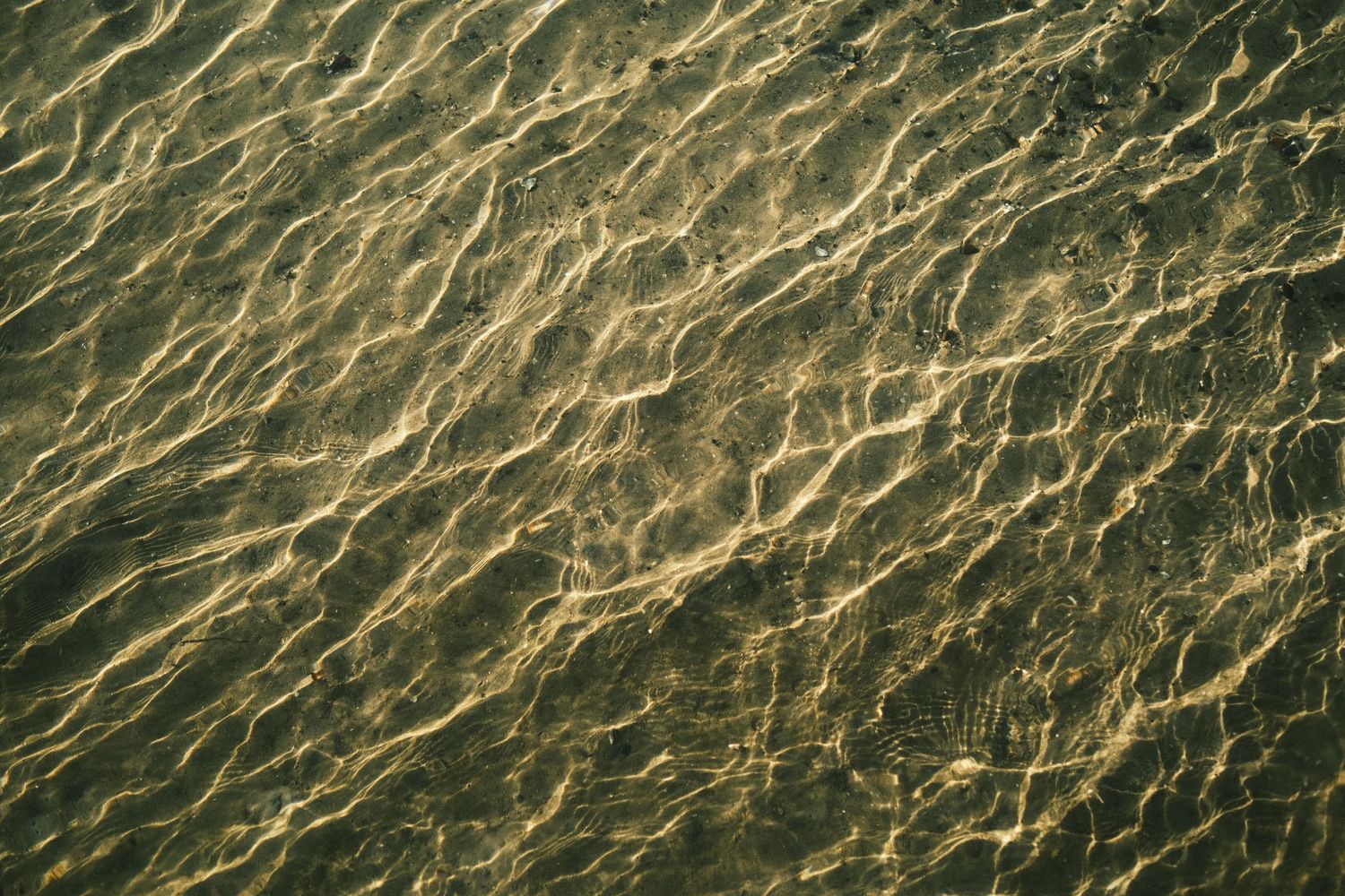 water, ocean, cinematic tones, light and shadow, aesthetic vibes, urban contrast, minimalist, water pattern, photography