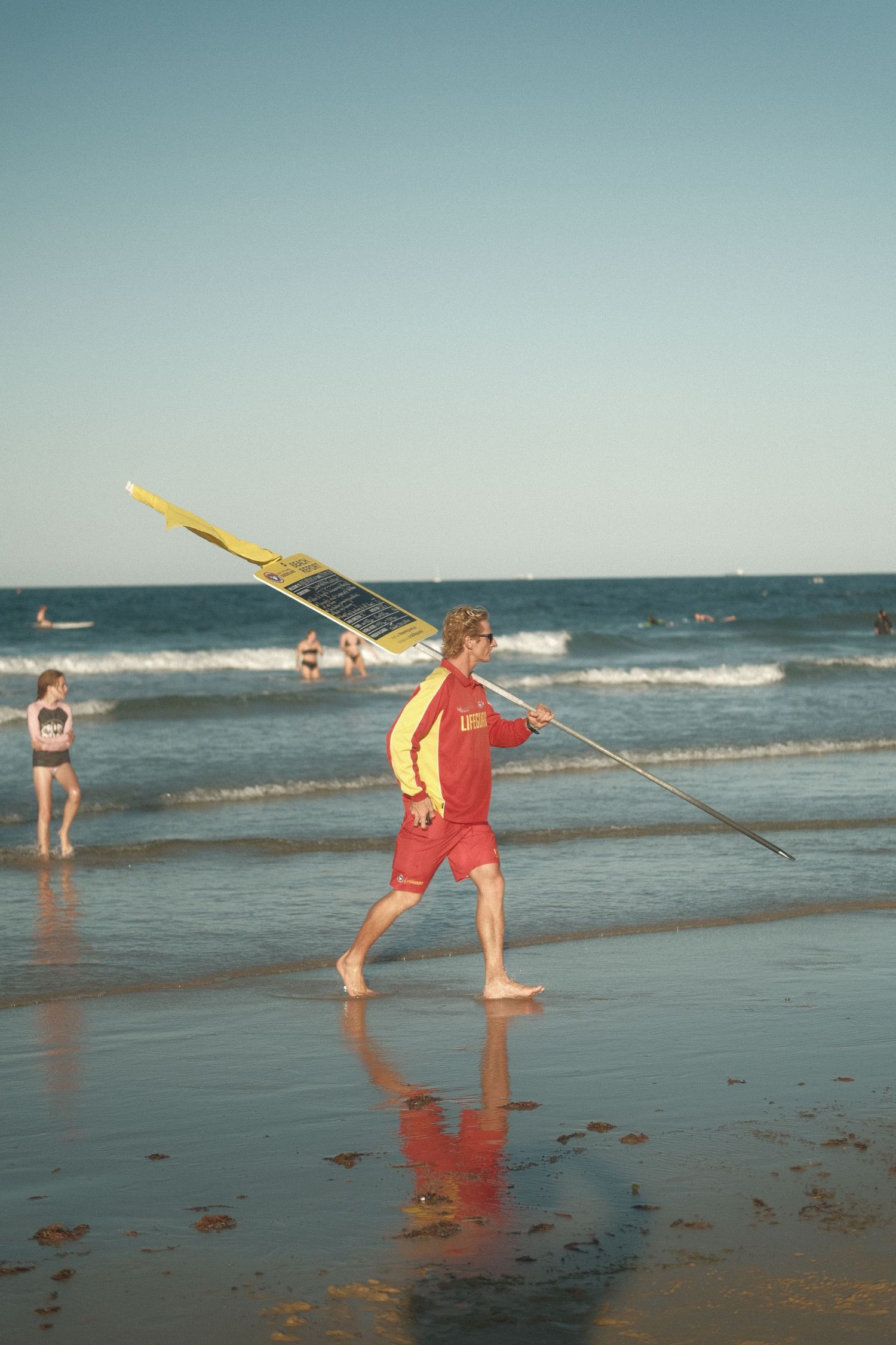 surfing action, wave riding, crack, surf life saving, moody street photography, urban contrast, cinematic tones, light and shadow, p