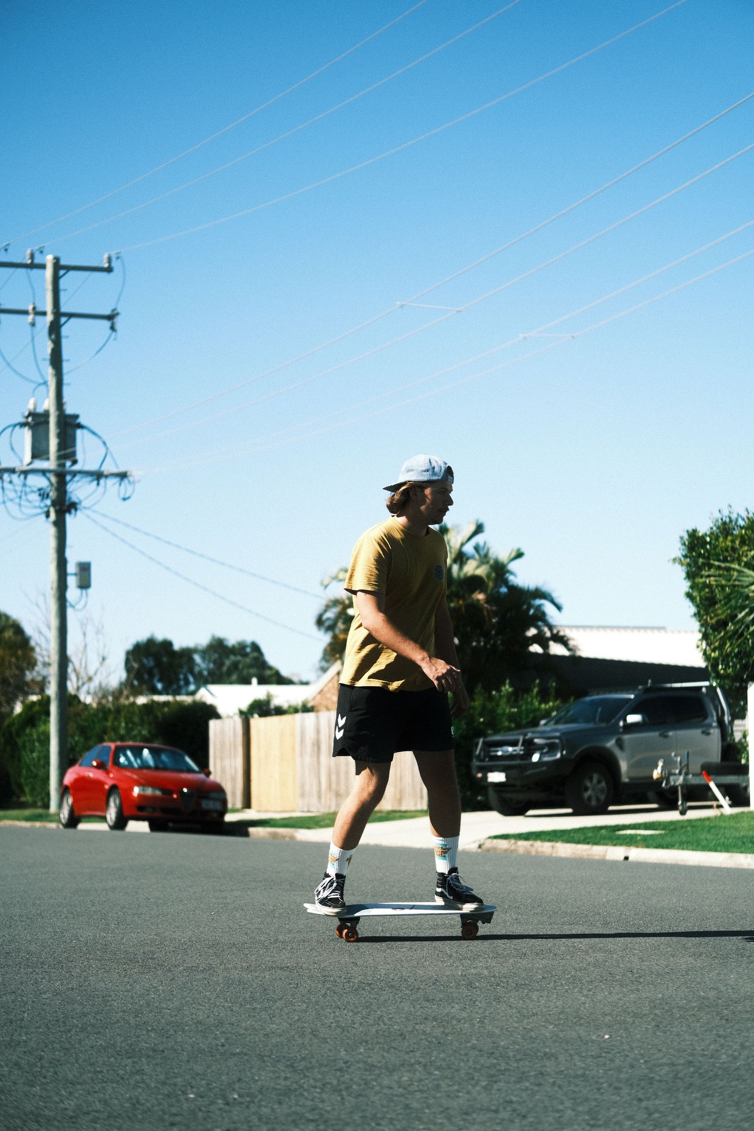 retro, cinematic tones, light and shadow, aesthetic vibes, skating, minimalist, skate boy, Life in Motion, photography