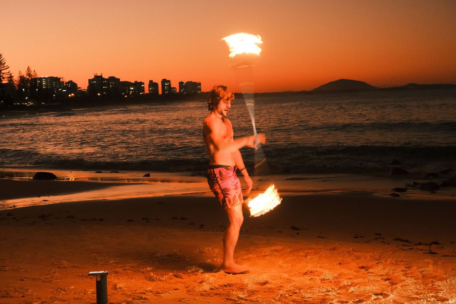 fire, fire dance, portrait, performance, water, ocean, cinematic tones, light and shadow, aesthetic vibes, photography