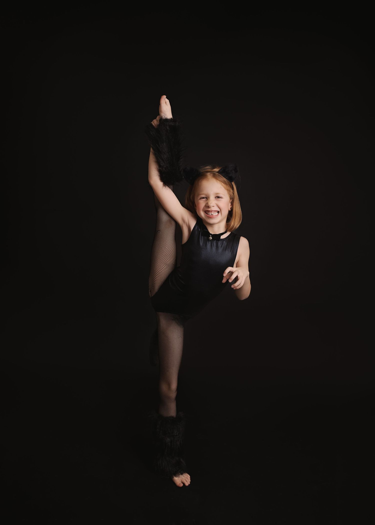 Four dramatic dance poses captured in black leotard against dark background showing dynamic movement.