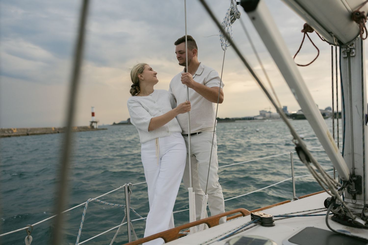 Gentle embrace captured during a sailing excursion with coastal views.