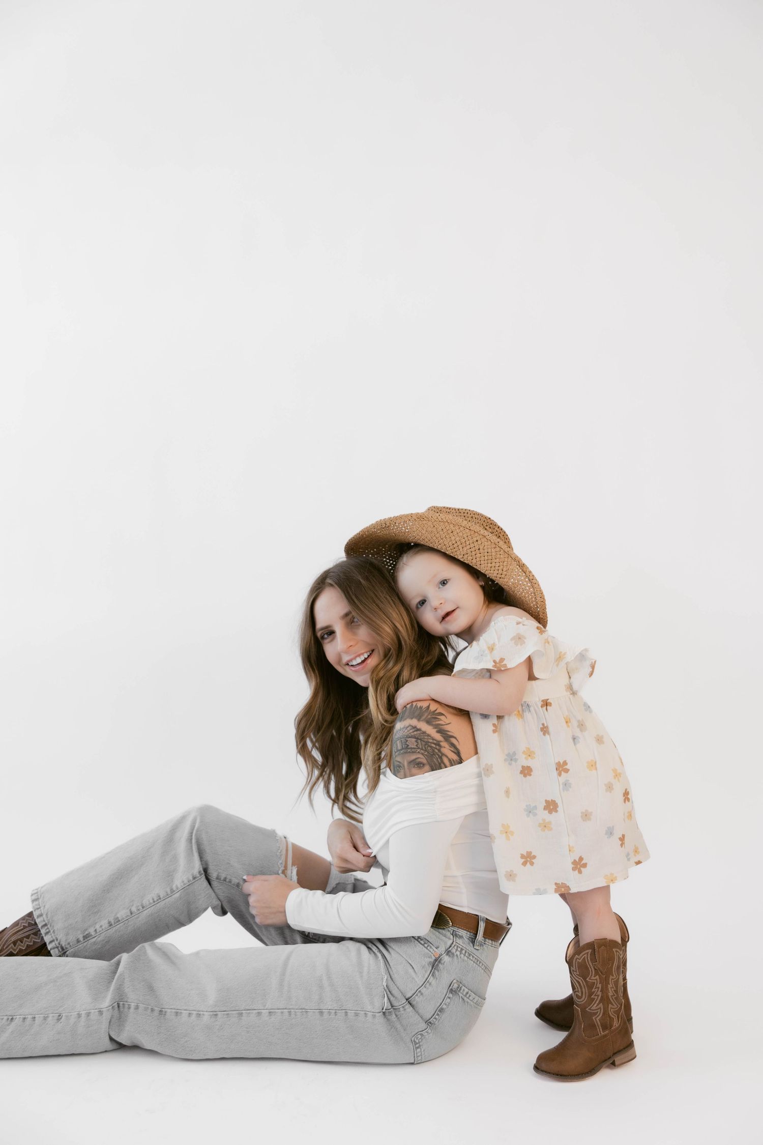 Casual lifestyle portraits show relaxed moments between parent and child on white background.