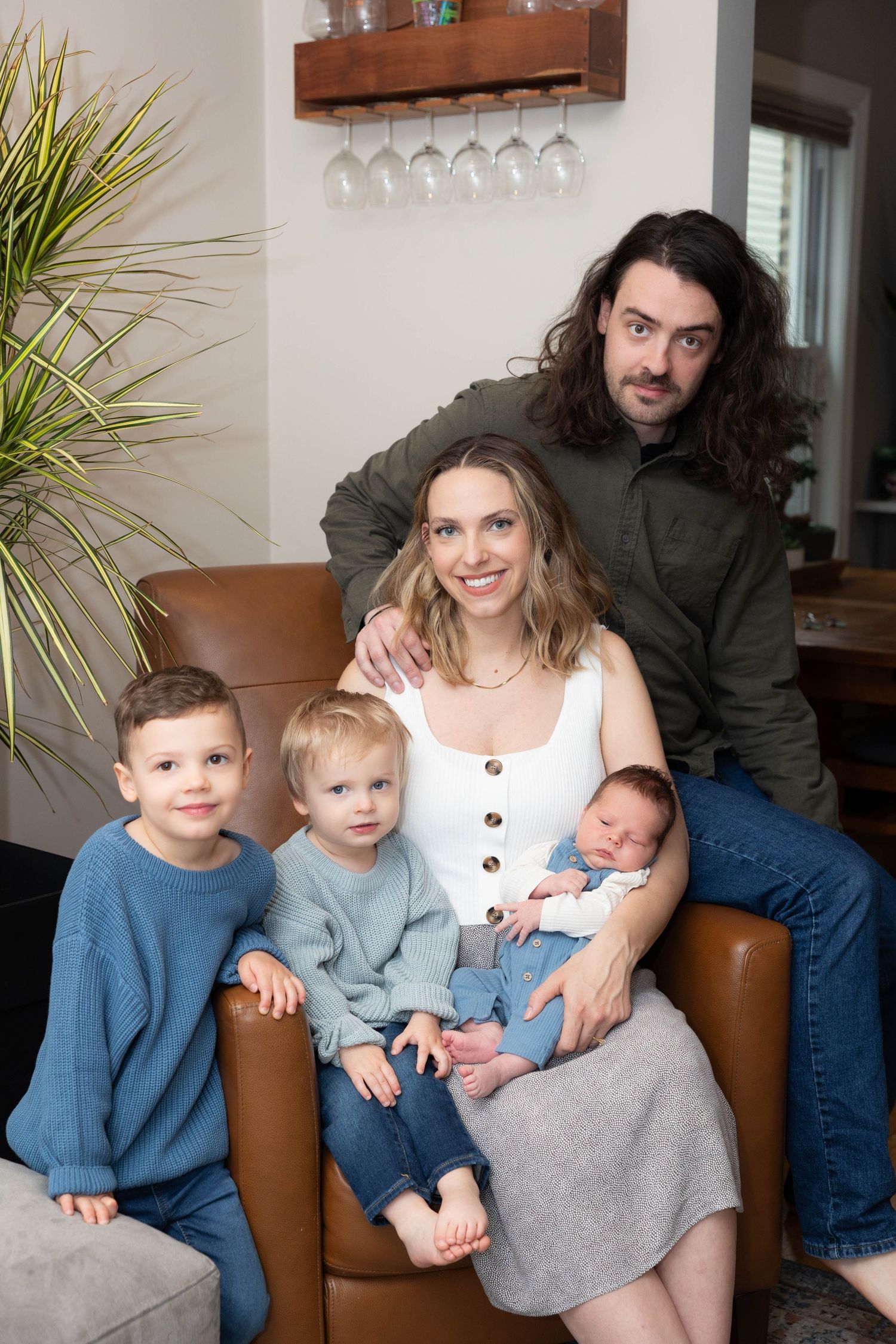 FAMILY PHOTOSHOOT SITTING IN CHAIR