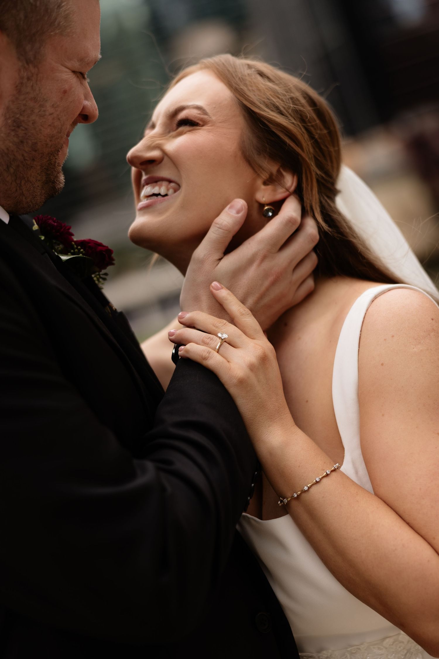 A tender moment between newlyweds as they share an intimate embrace during their wedding celebration.