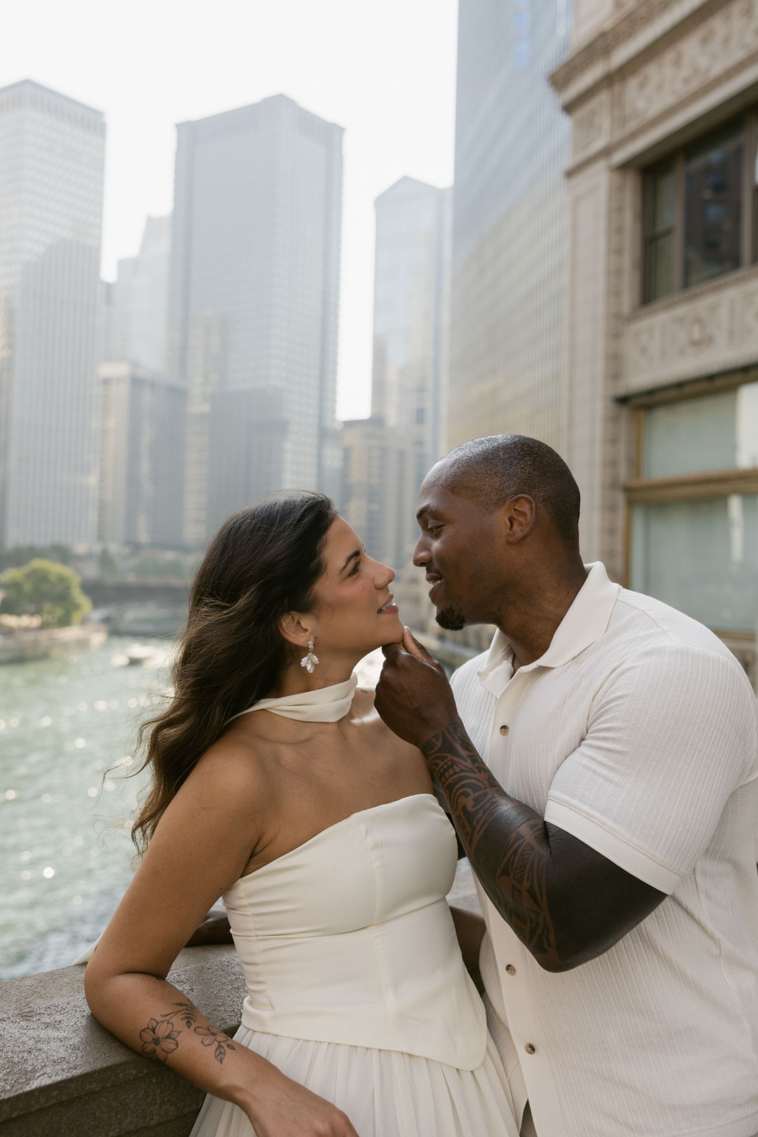 Intimate couple portraits with Chicago's waterfront skyline in the background.