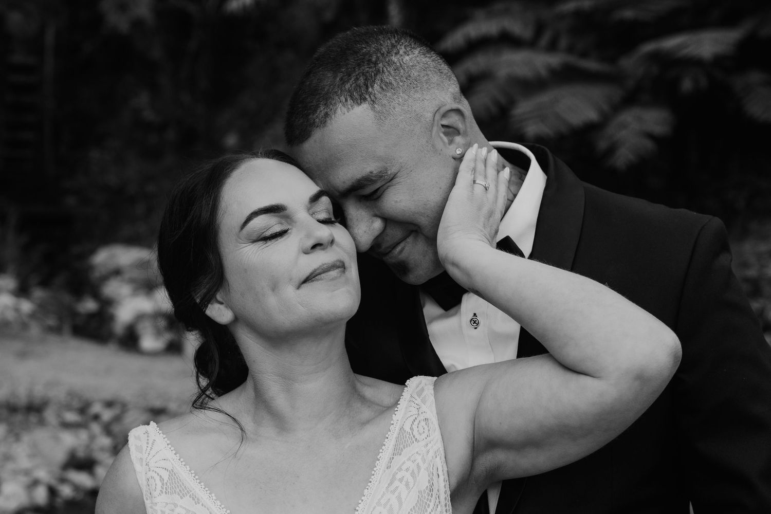 Black and white photo montage showing intimate moments between two people in a romantic embrace.