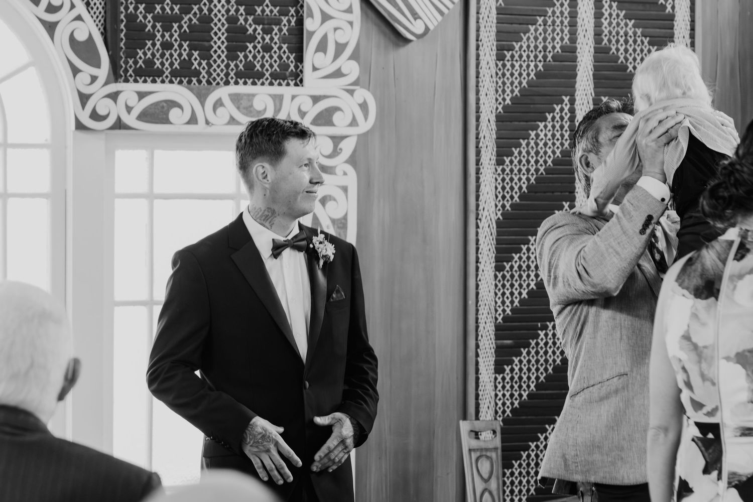 A black and white grid of candid romantic moments showing couples in formal attire dancing and embracing at an elegant event.