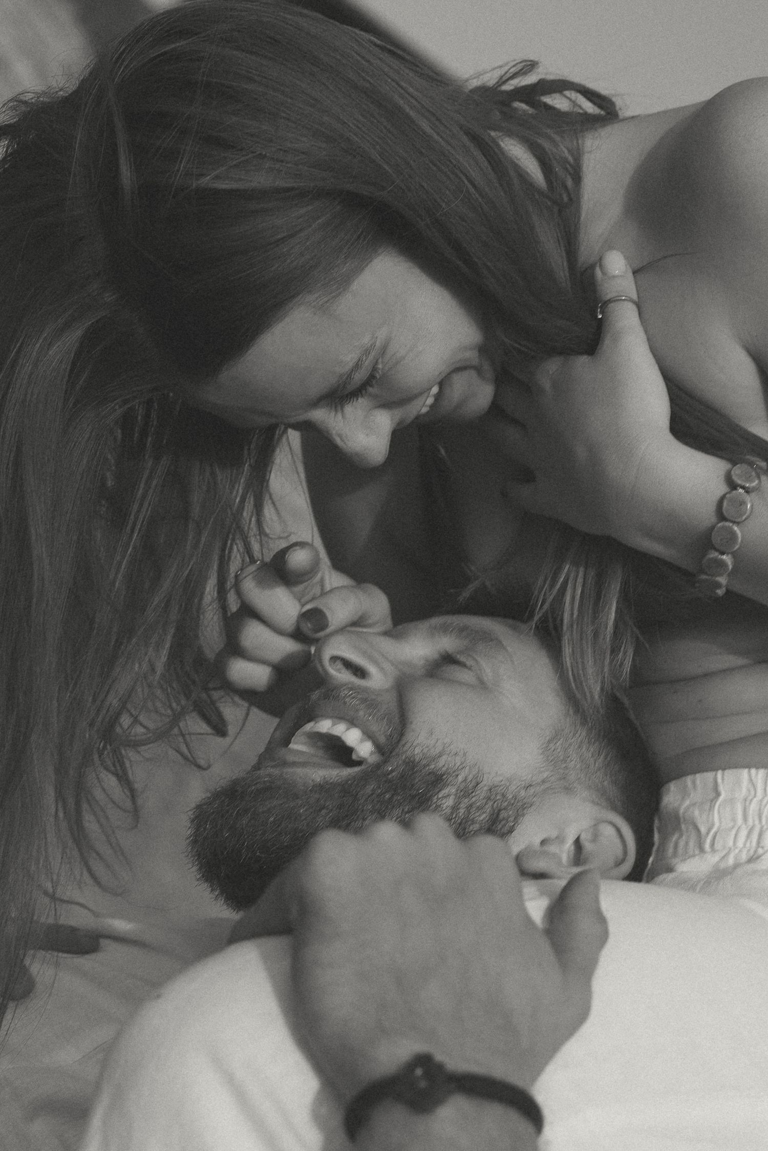 Black and white intimate portrait series showing tender moments between a couple.