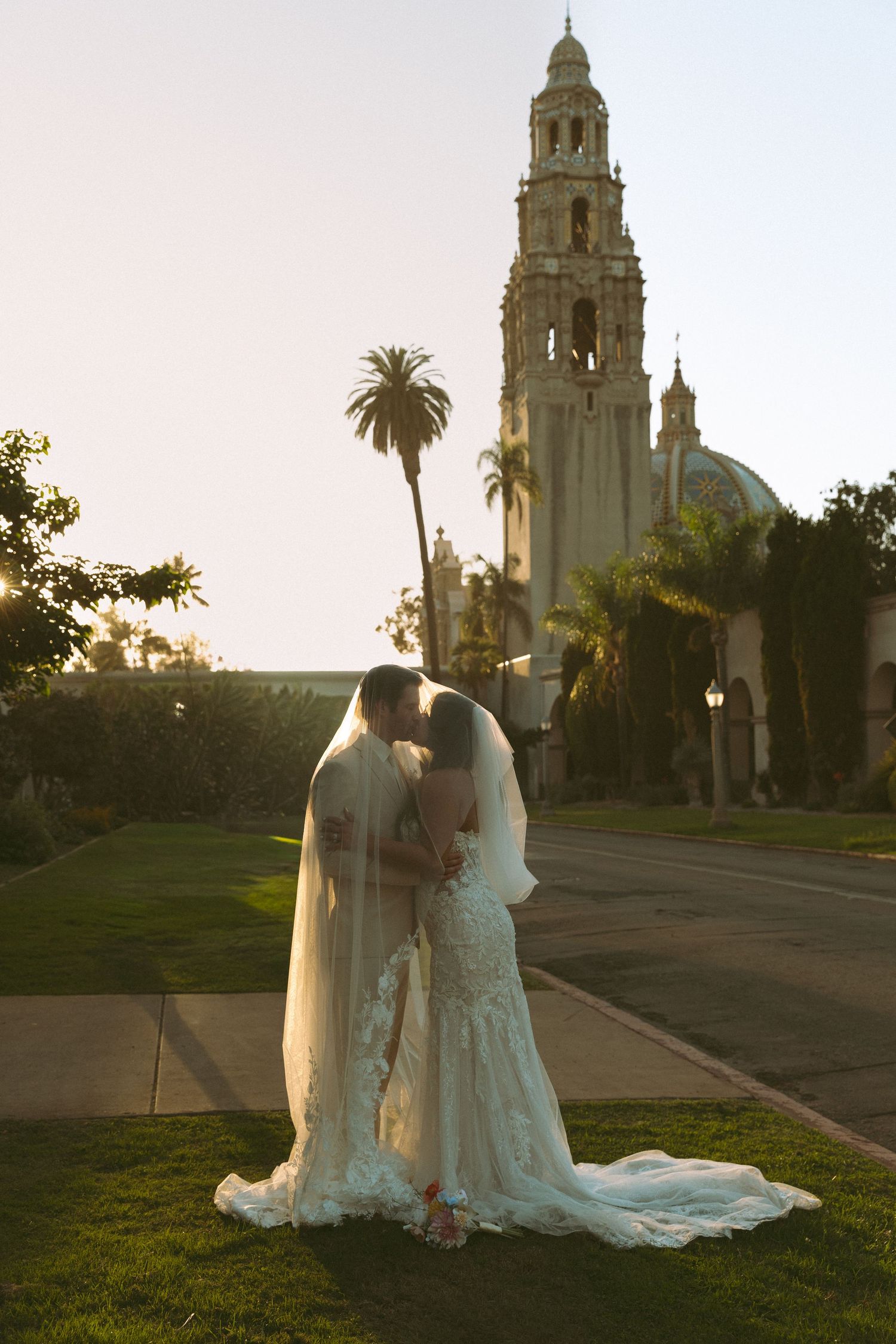 Romantic Balboa Park wedding portraits in San Diego featuring timeless architecture, golden hour light and documentary-style photography