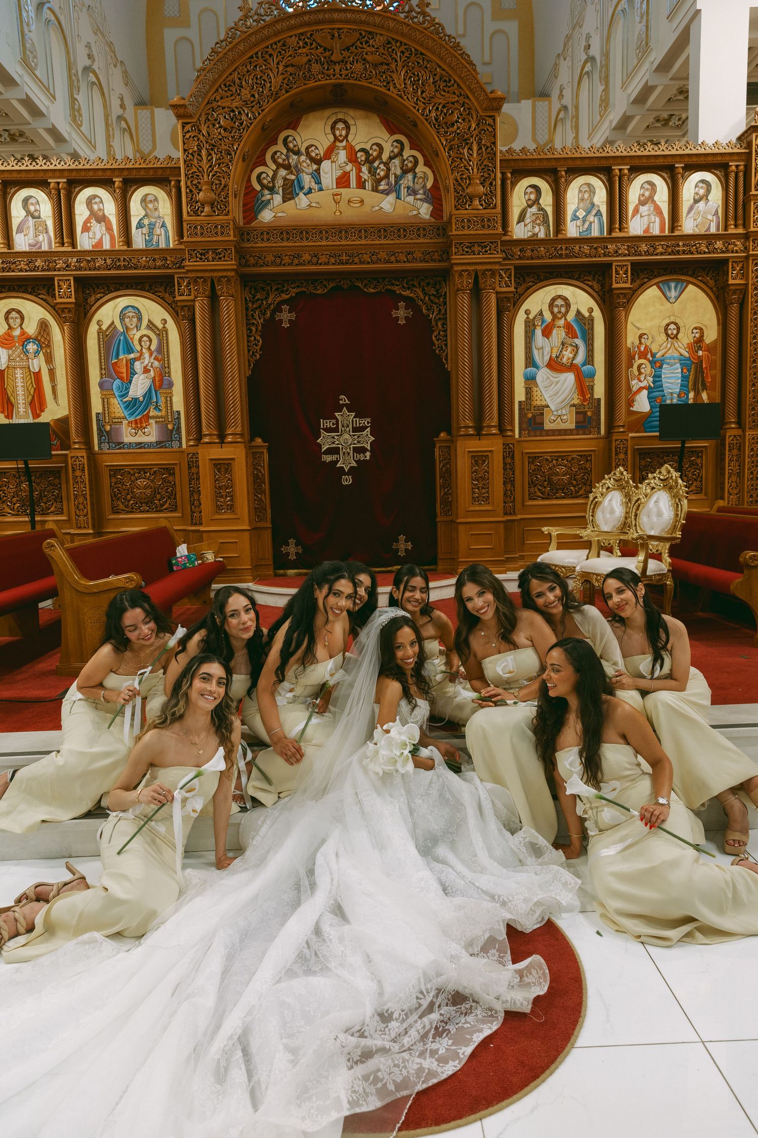 Bride with her bridesmaids inside the church, captured with film wedding photography Southern California style.