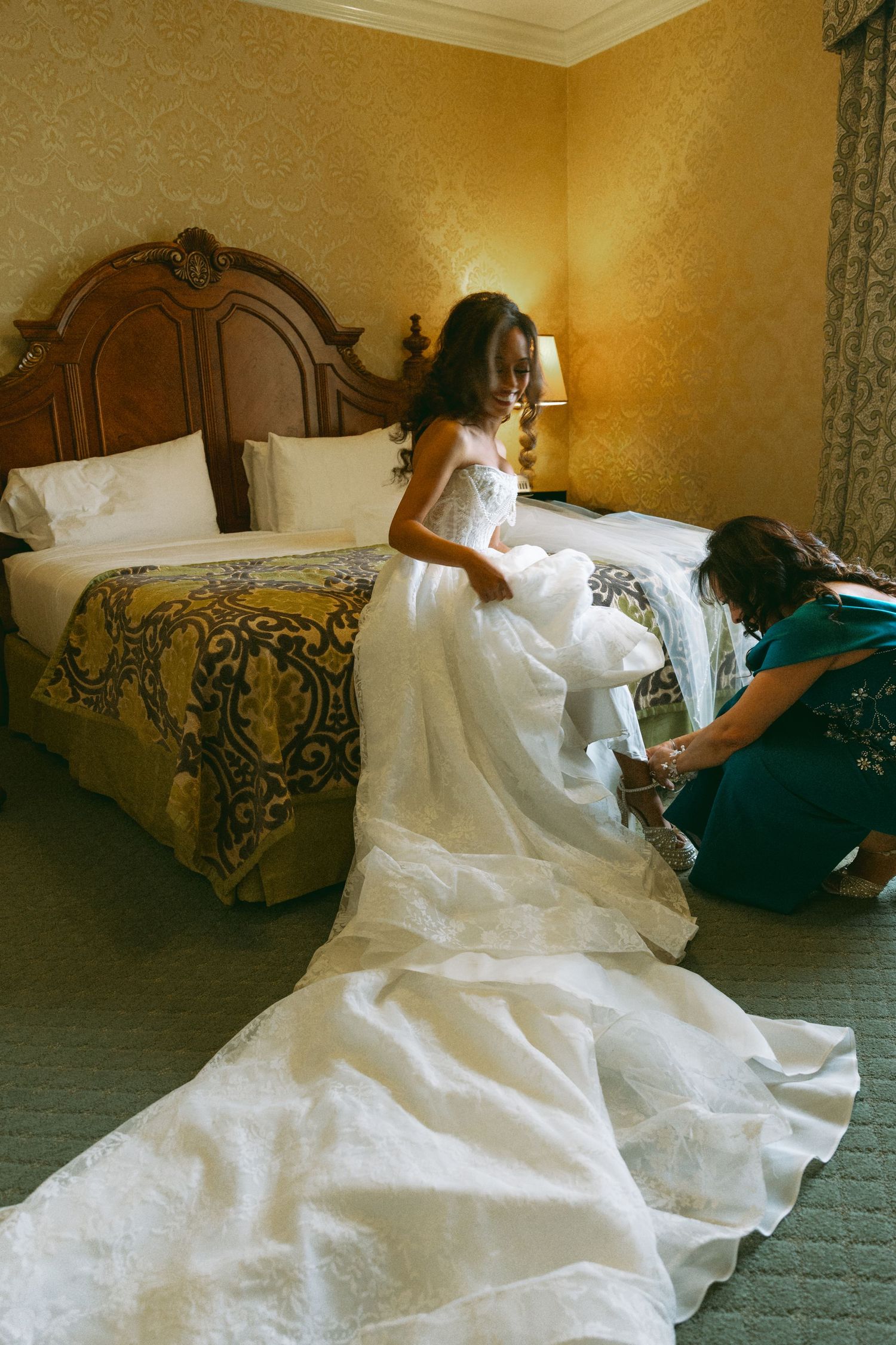 Bride getting ready in her wedding dress, intimate wedding photography in Southern California
