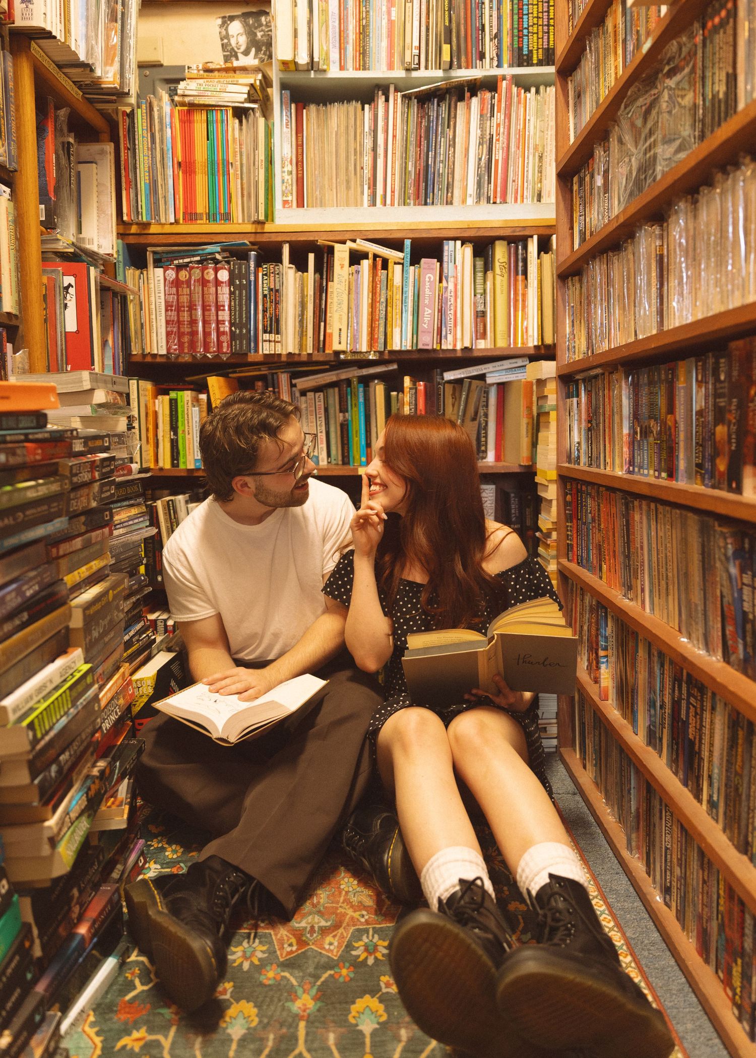 Cozy library scene with bookshelves creating an intimate reading atmosphere.