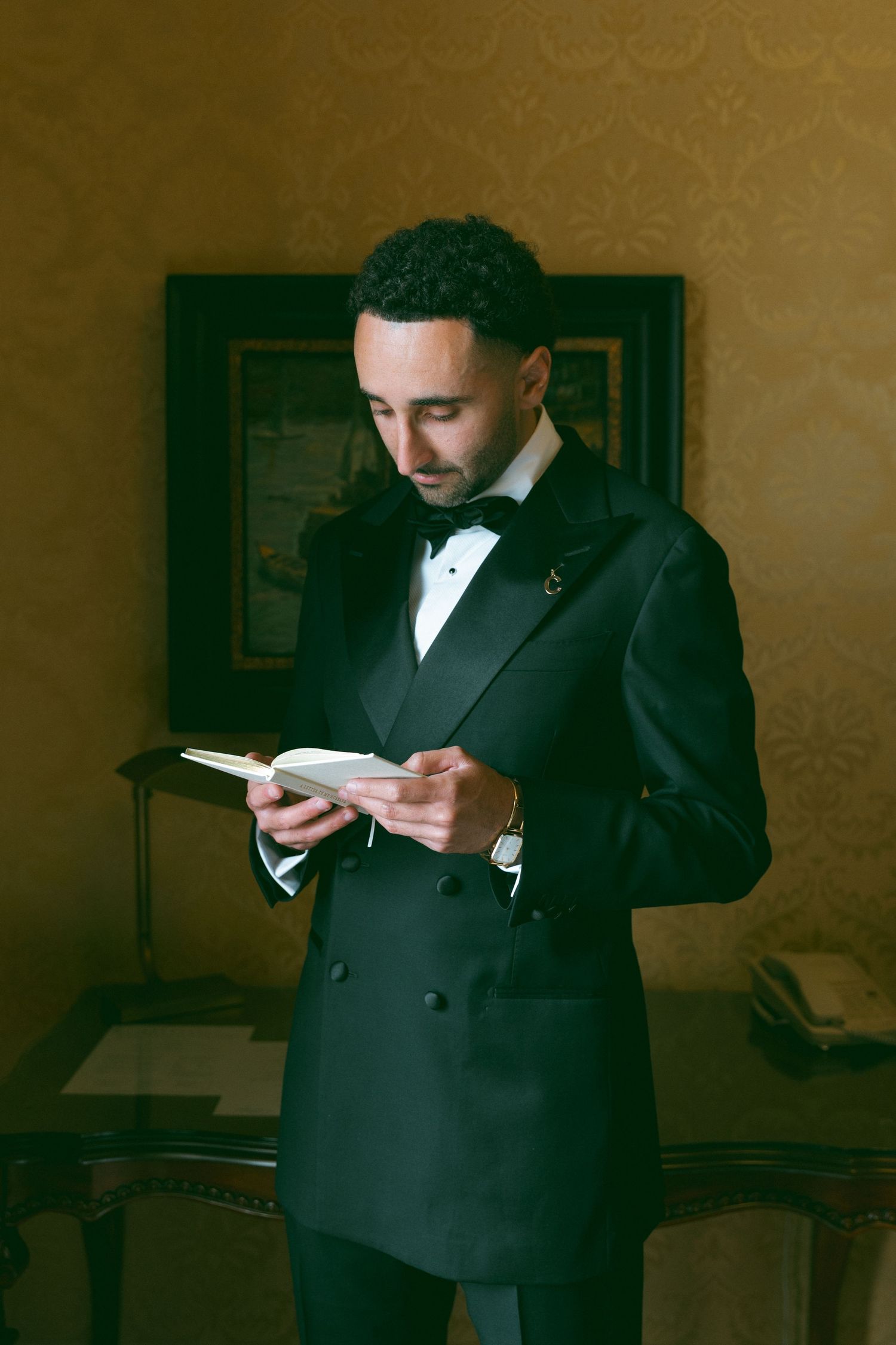 Groom getting ready before his wedding ceremony, captured by a Southern California wedding photographer