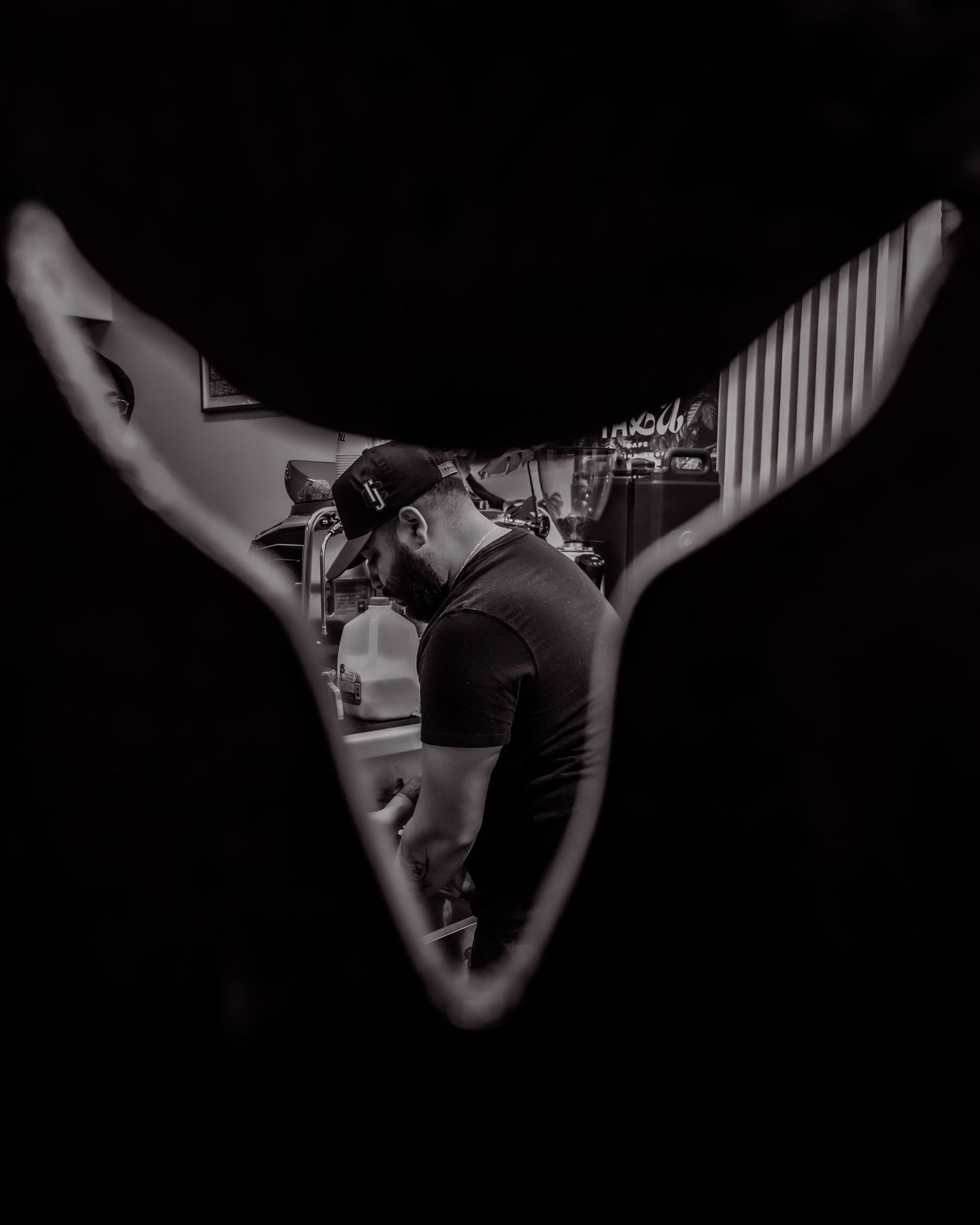 Artistic black and white photo series showing hands and arms in dramatic lighting against dark backgrounds.