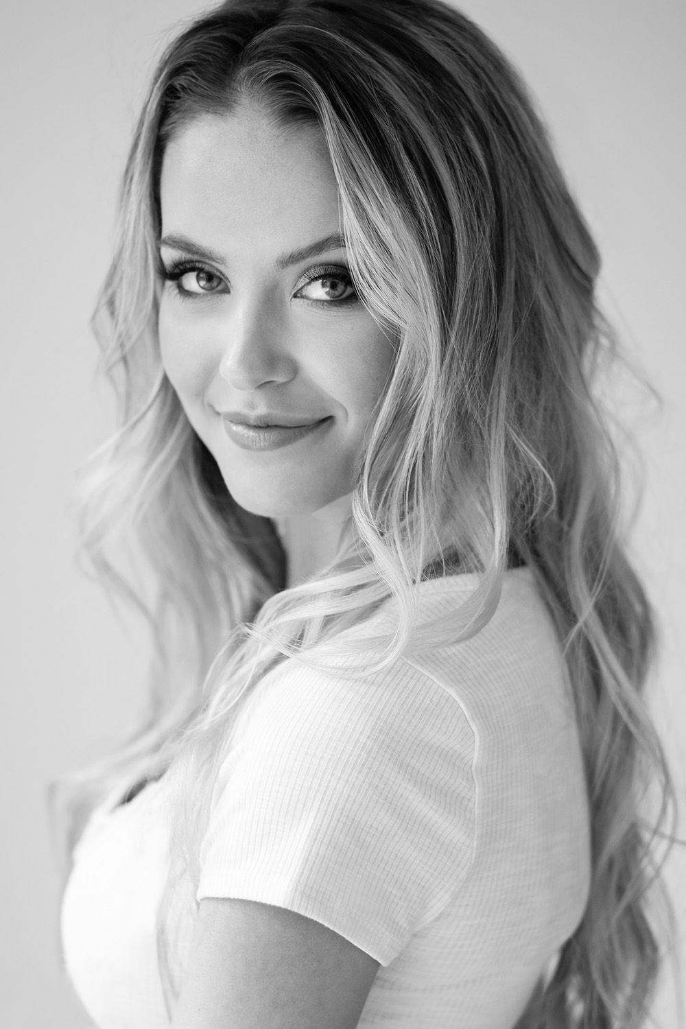 Black and white dancer headshot, professional studio portrait”