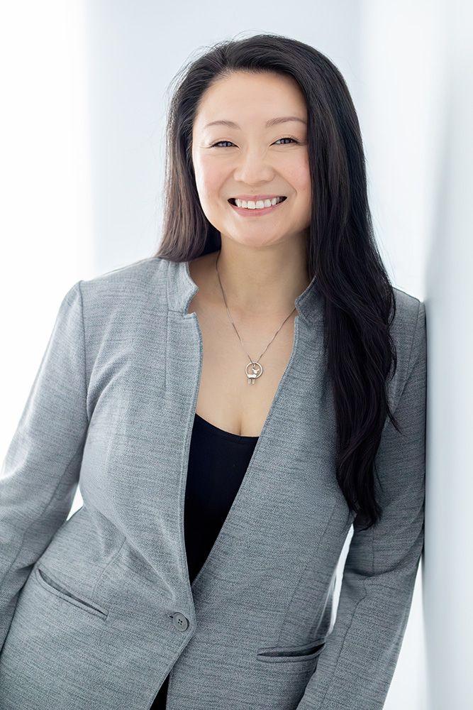 Gaming industry professional headshot, female business portrait with clean background