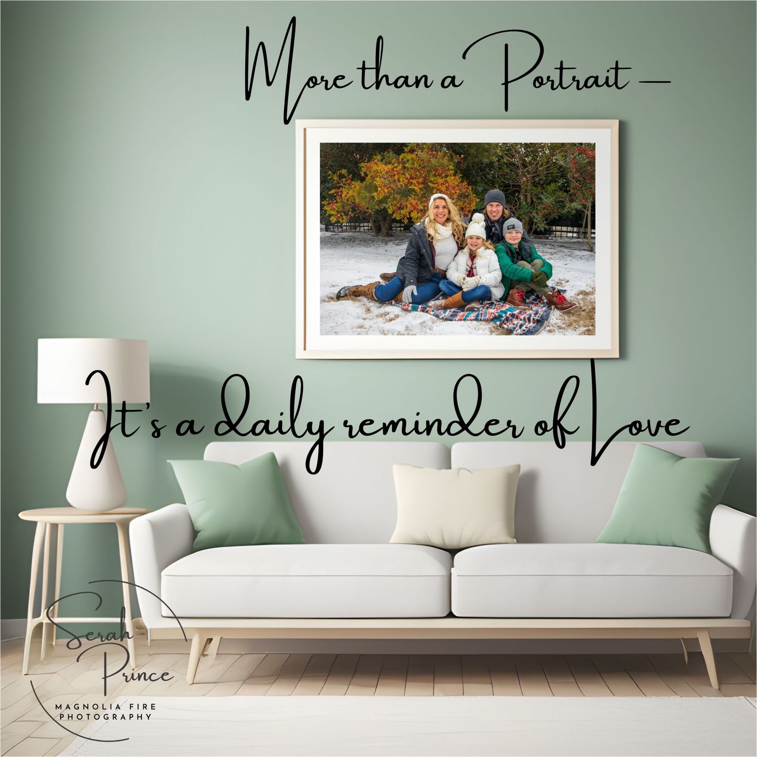Modern living room interior with white sofa, sage green walls and decorative wall text above framed family photo.