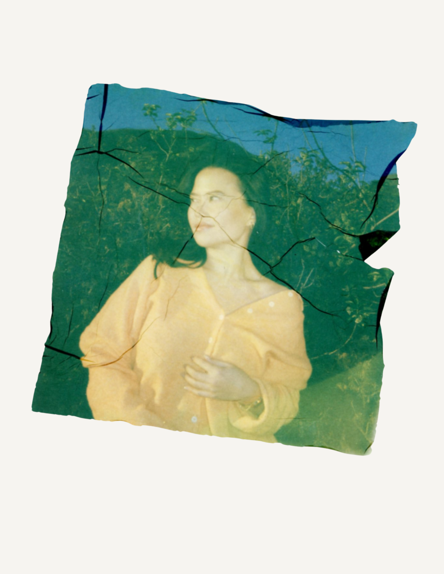 Handmade Polaroid emulsion lift portrait showcasing experimental analog photography.