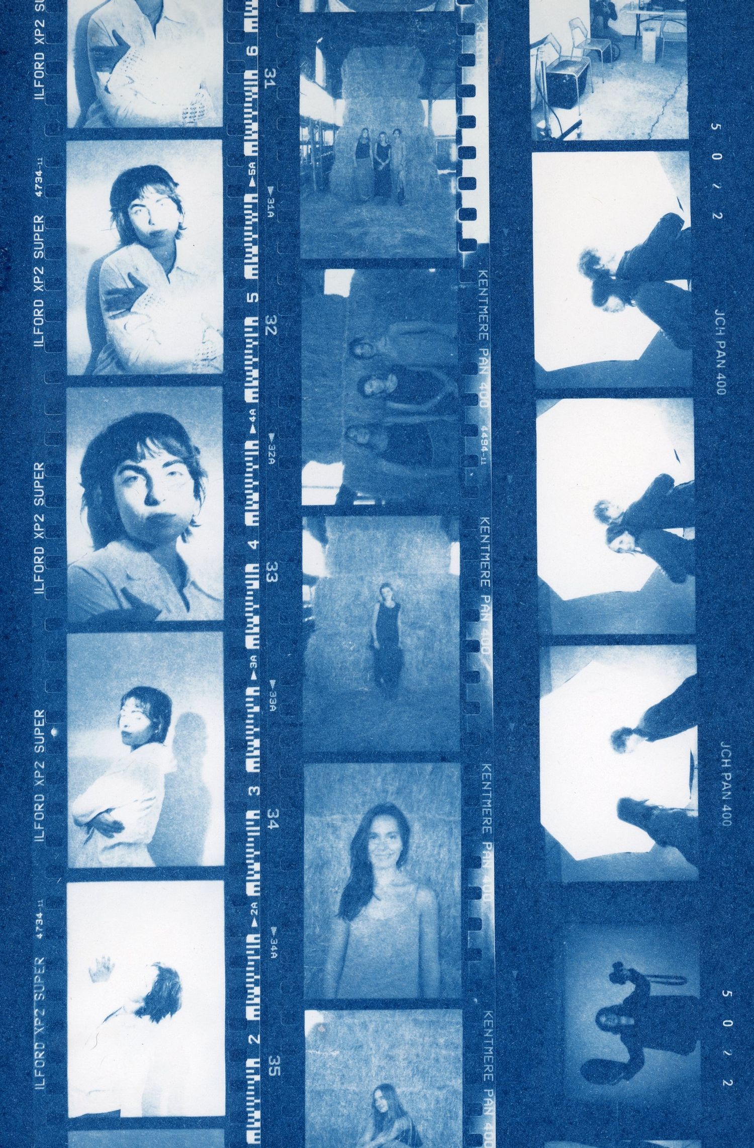 Handmade cyanotype contact sheet created from black and white film negatives.