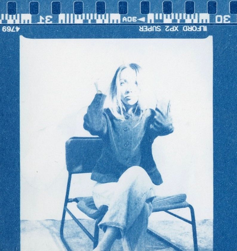 Handmade cyanotype portrait created from a black and white film negative.