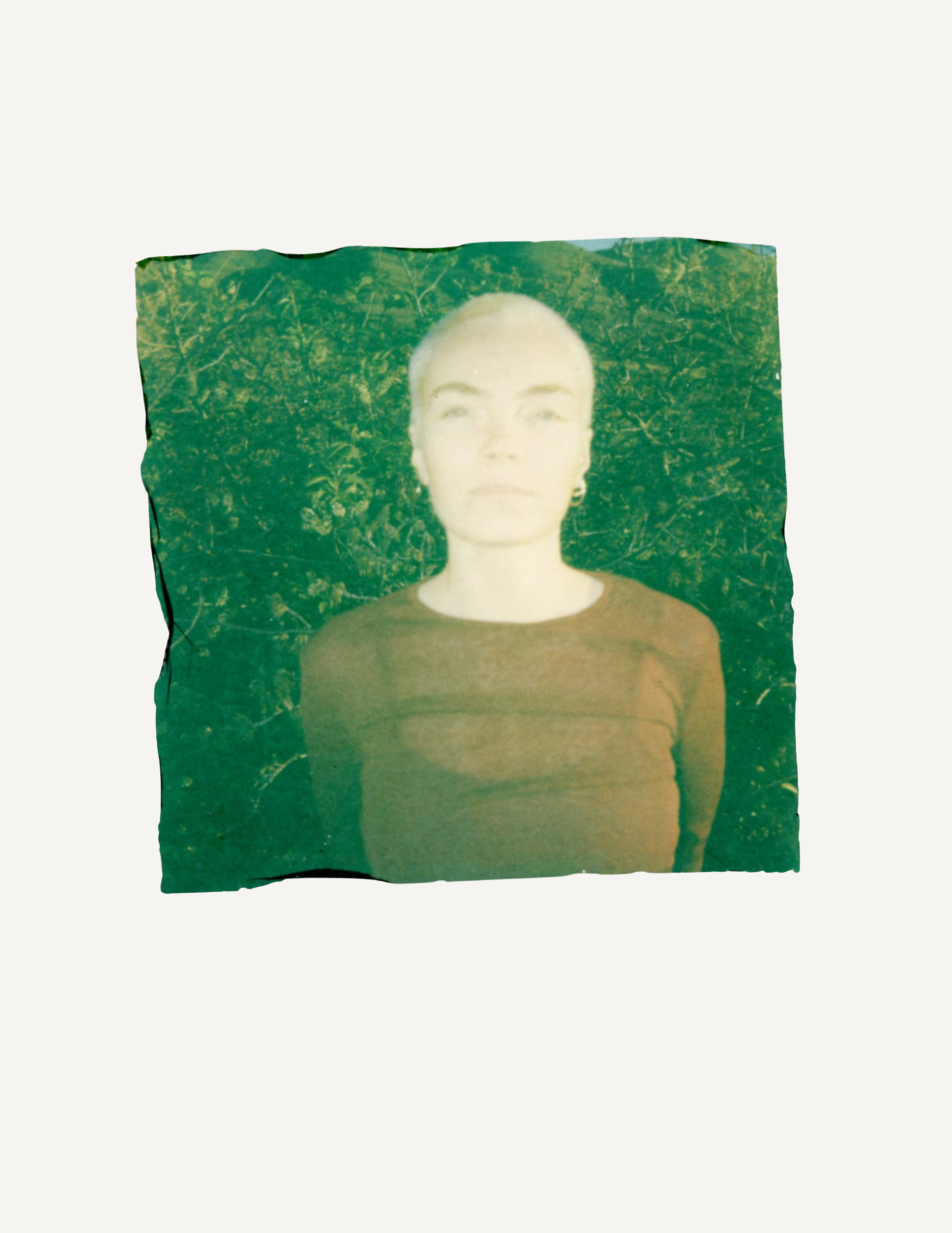Handmade Polaroid emulsion lift featuring an experimental portrait.