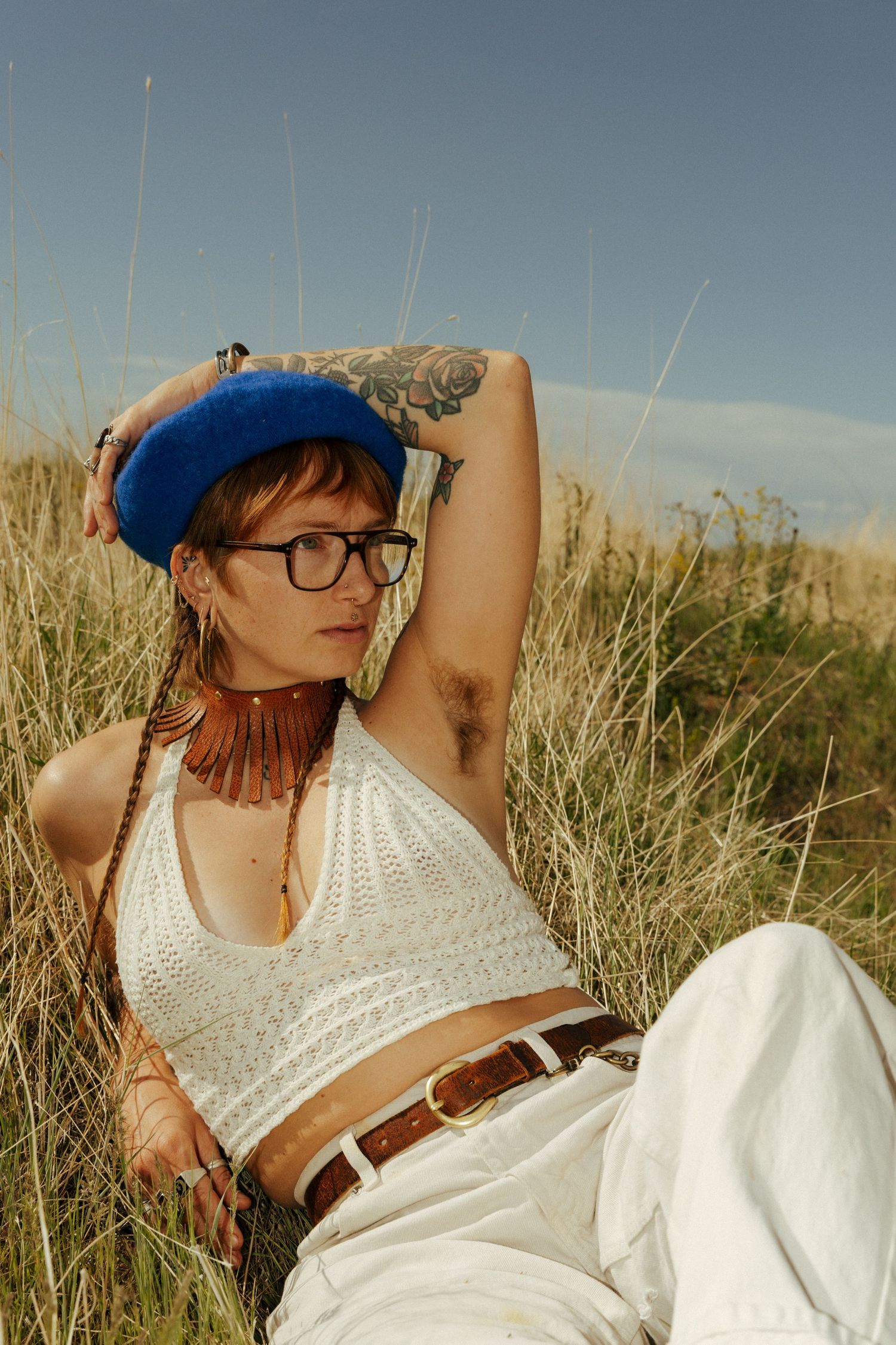 Creative outdoor portrait of a woman in western-inspired clothing in Salt Lake City, Utah.