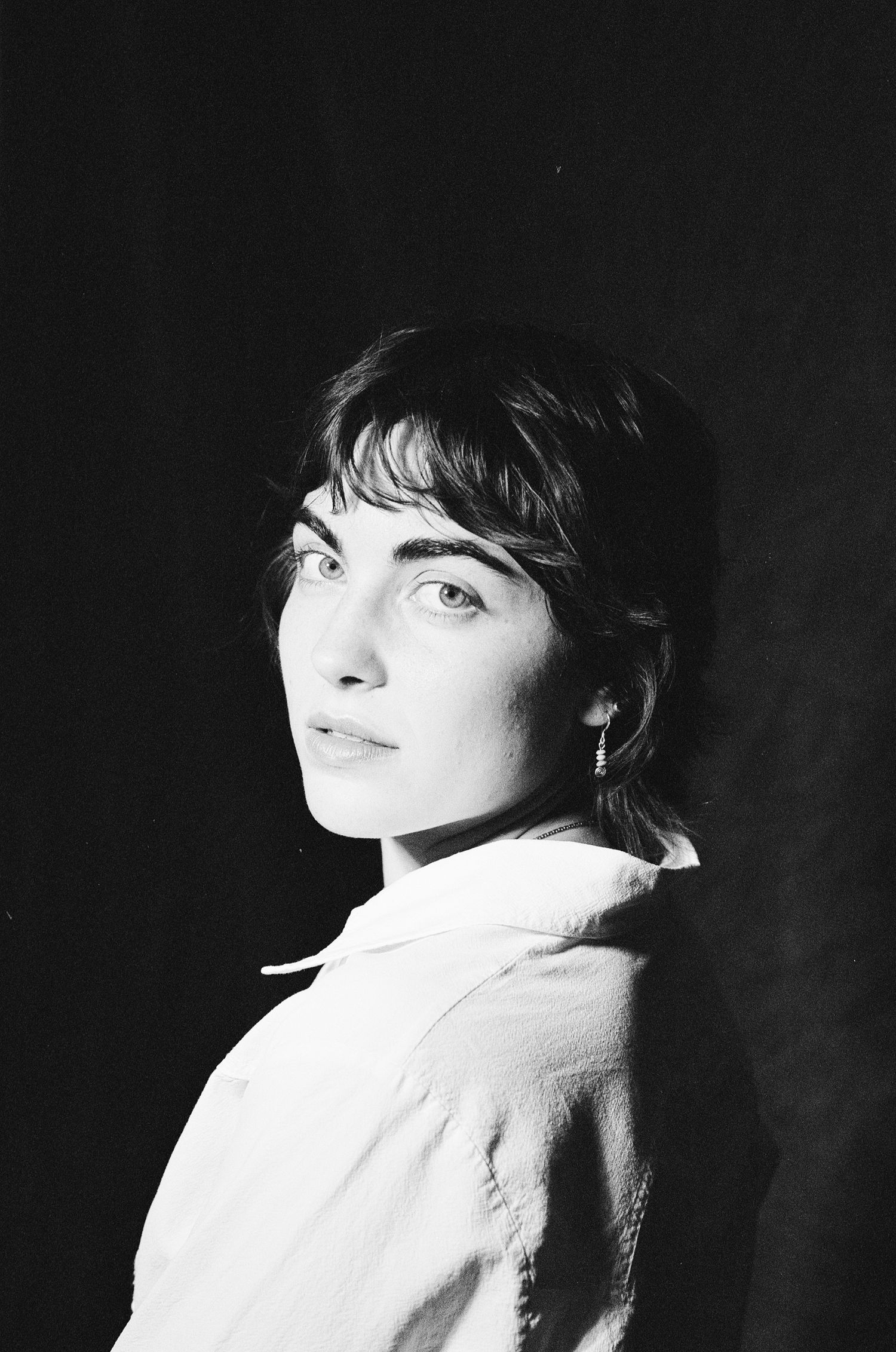 Black and white film portrait with dramatic light, editorial portrait photography in Salt Lake City, Utah.
