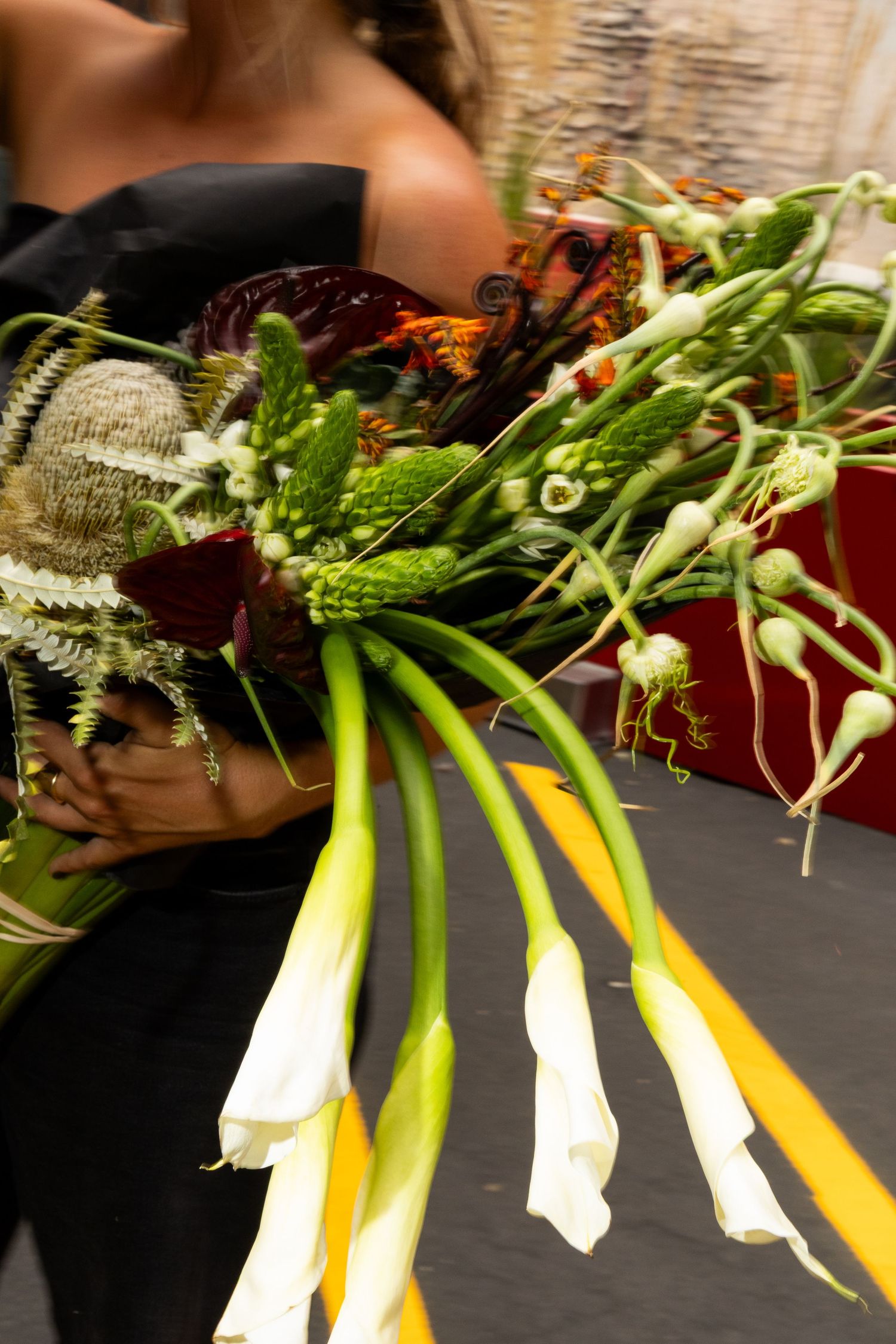Artful bridal bouquet with sculptural florals photographed at a Utah wedding.
