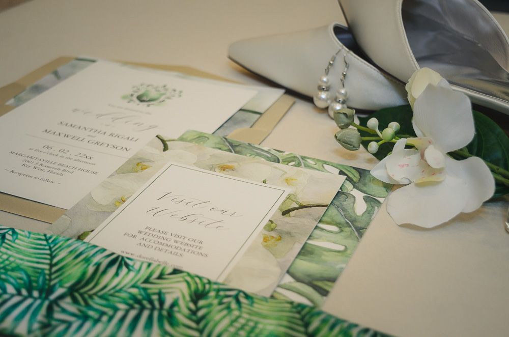 Flat Lay of invitation and jewelry