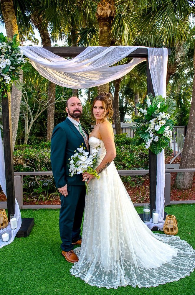 the couple at the alter for formal photos