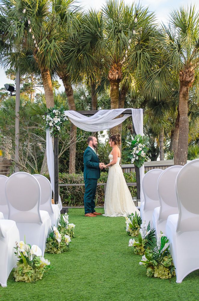 Couple posing at the alter at Crowne Plaza