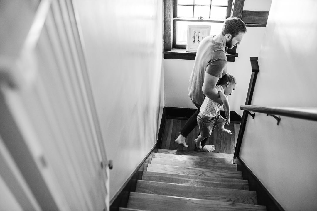 Lifestyle in-home family photography capturing real moments in an Omaha home.