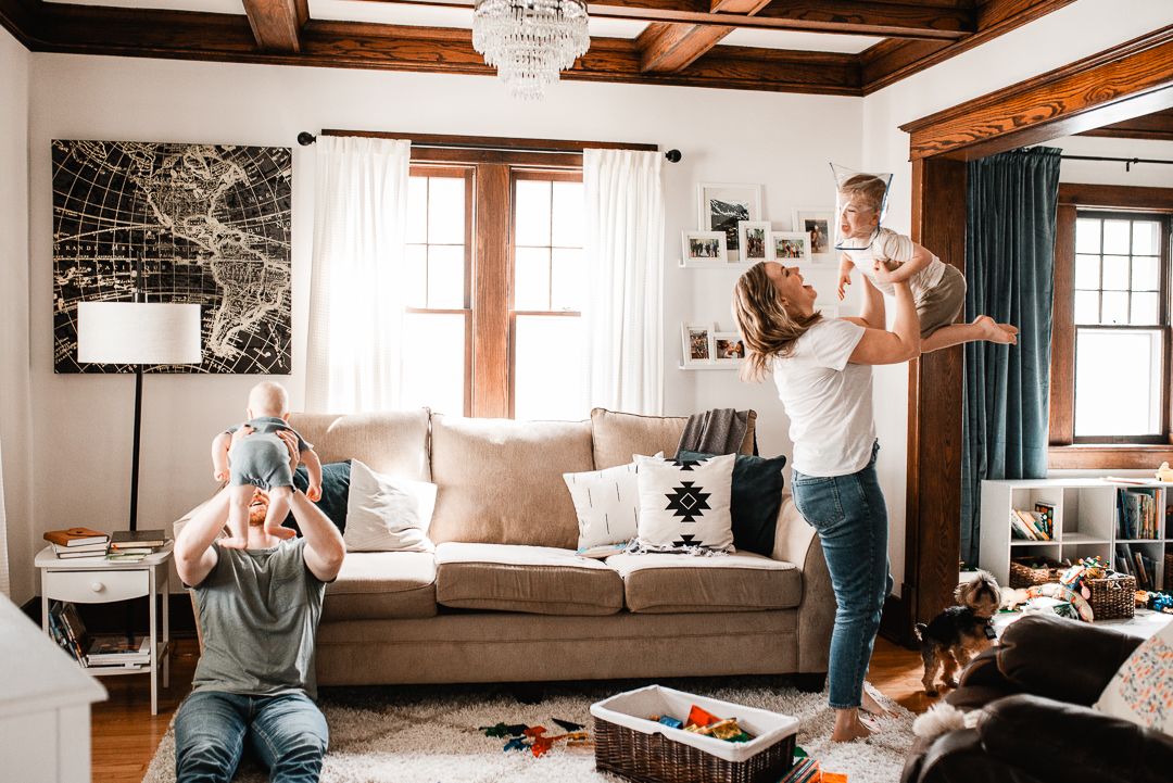 Lifestyle in-home family photography capturing real moments in an Omaha home.
