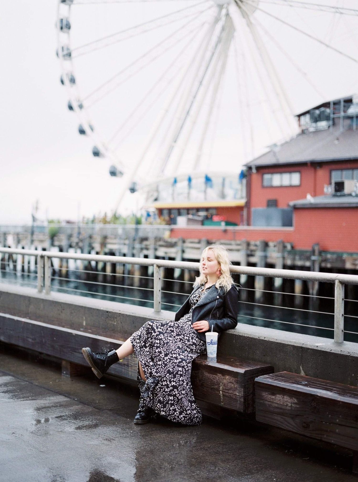 Girl enjoying her coffee at Seattle waterfront