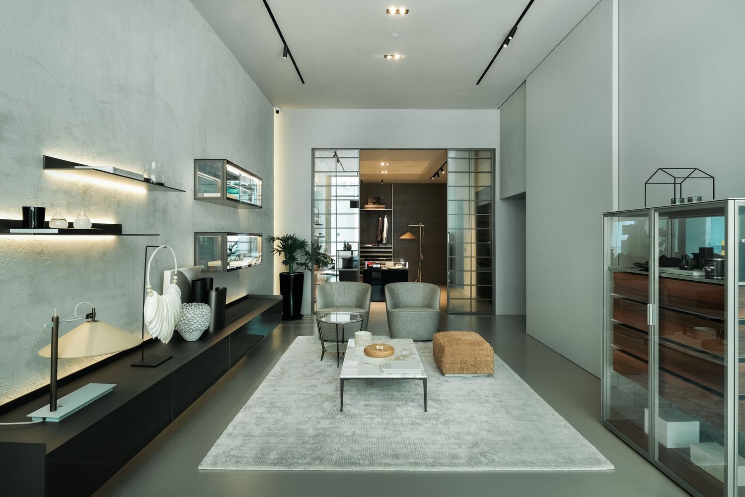 Modern open concept office interior with sleek furniture and minimalist design.
