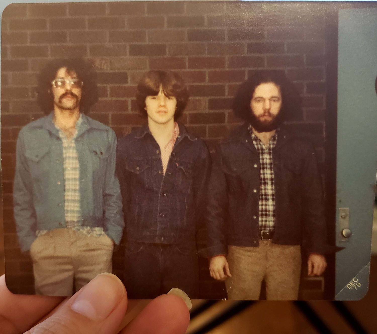 Family snapshot from the 60s of photographer's father and his two brothers. Doughman Photography.