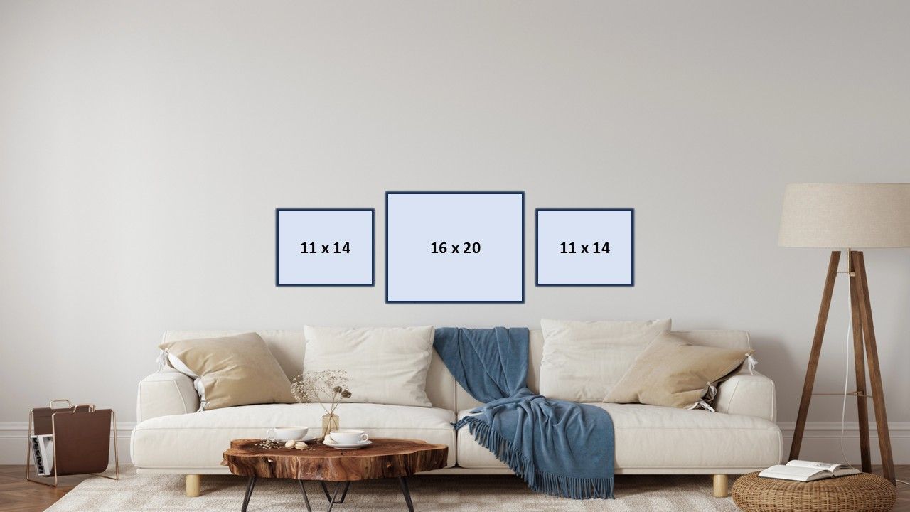 Hanging above the couch are three image mock-ups: 11x14, 16x20, 11x14. Gallery wall design. Doughman Photography.