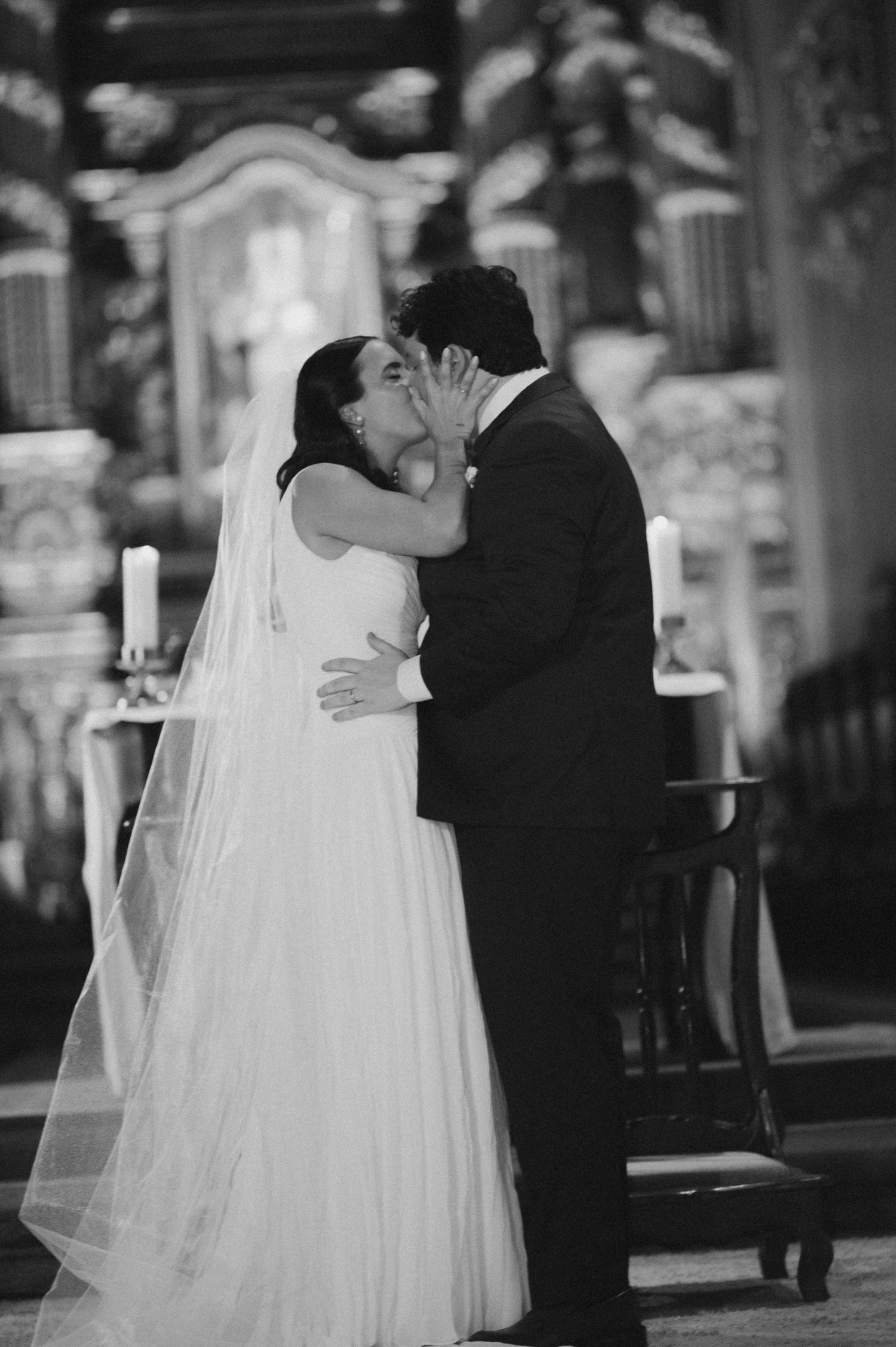 A romantic black and white wedding photo series shows a couple dancing together in elegant formal attire.