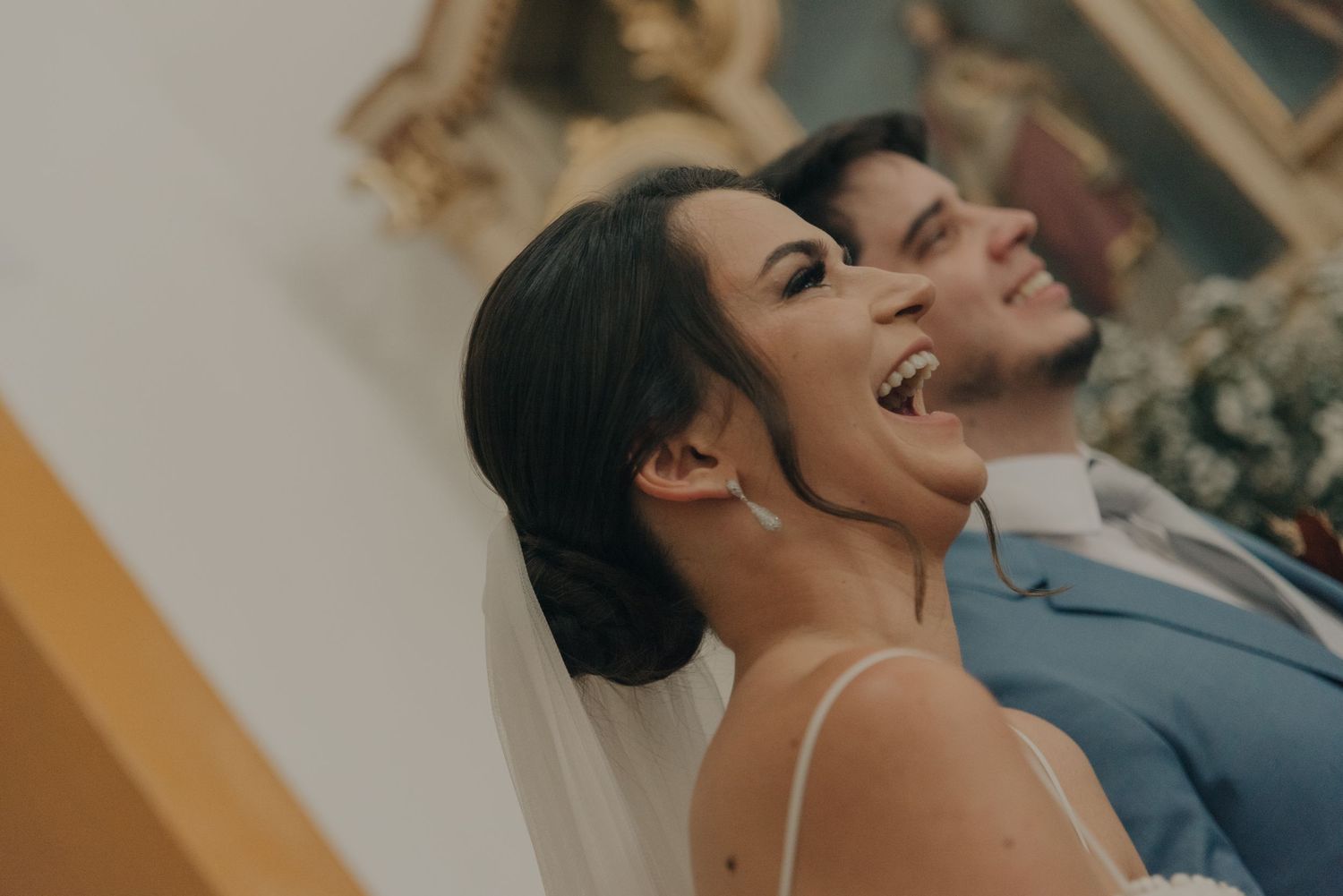 A joyful moment captured during a wedding ceremony.