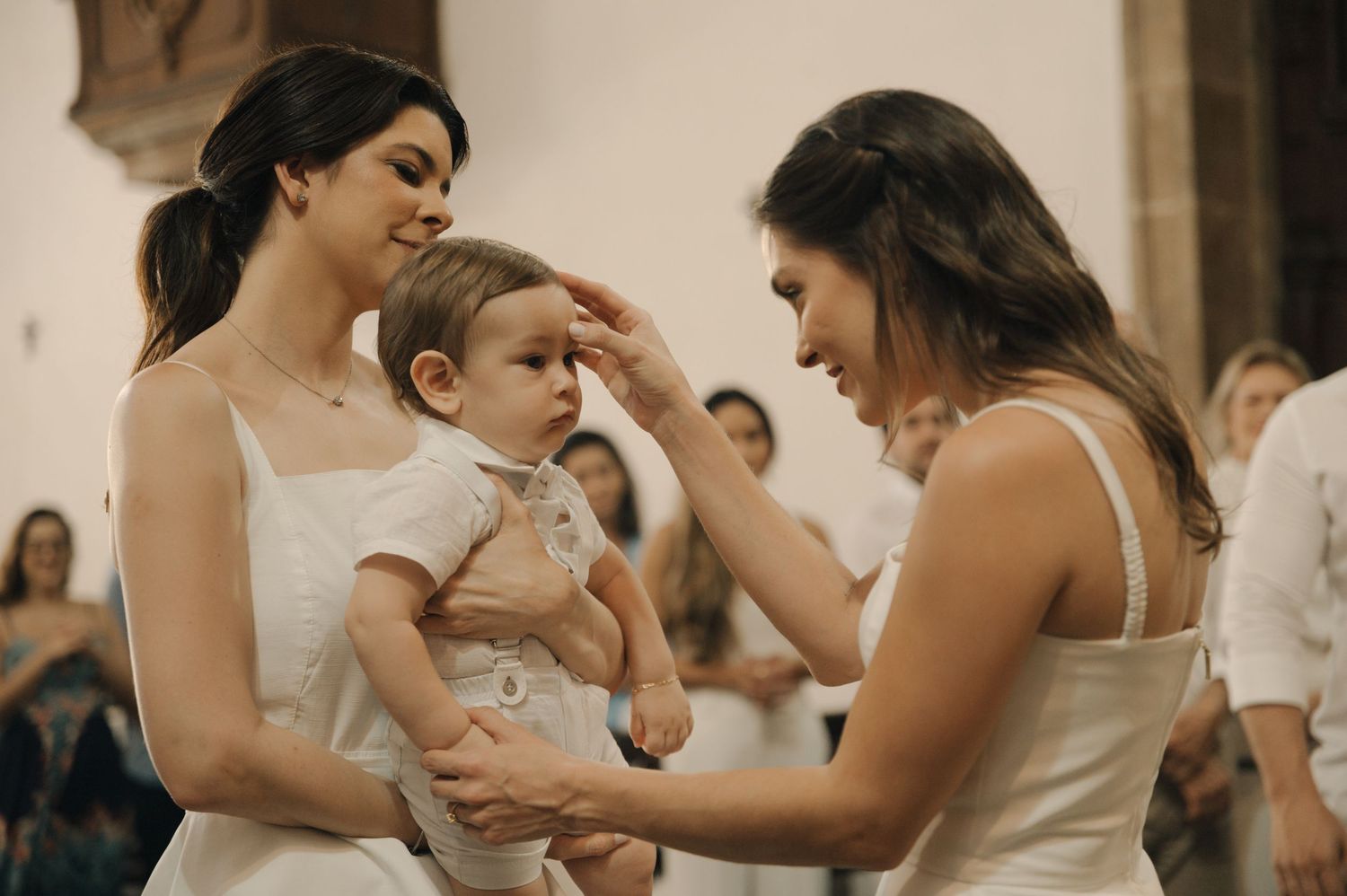 A sequence of dance steps being performed by people wearing white outfits during a group dance class.