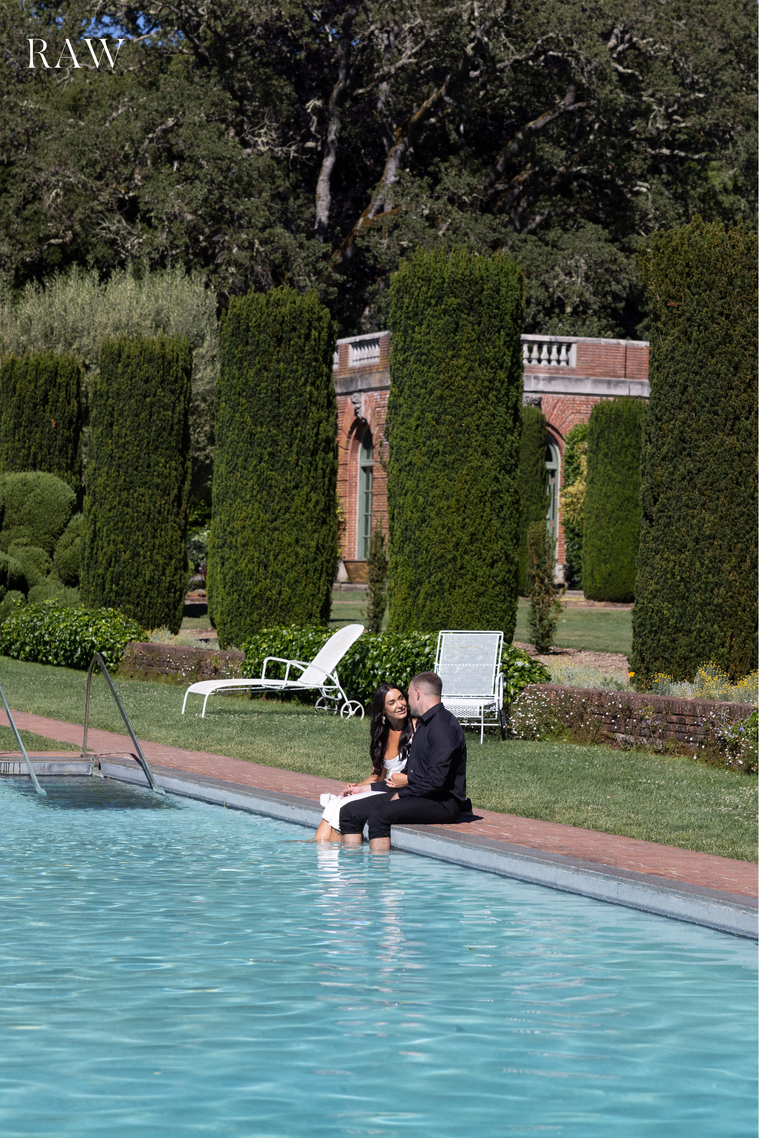 Series of shots showing a person falling into a backyard pool near hedges and brick pathways.