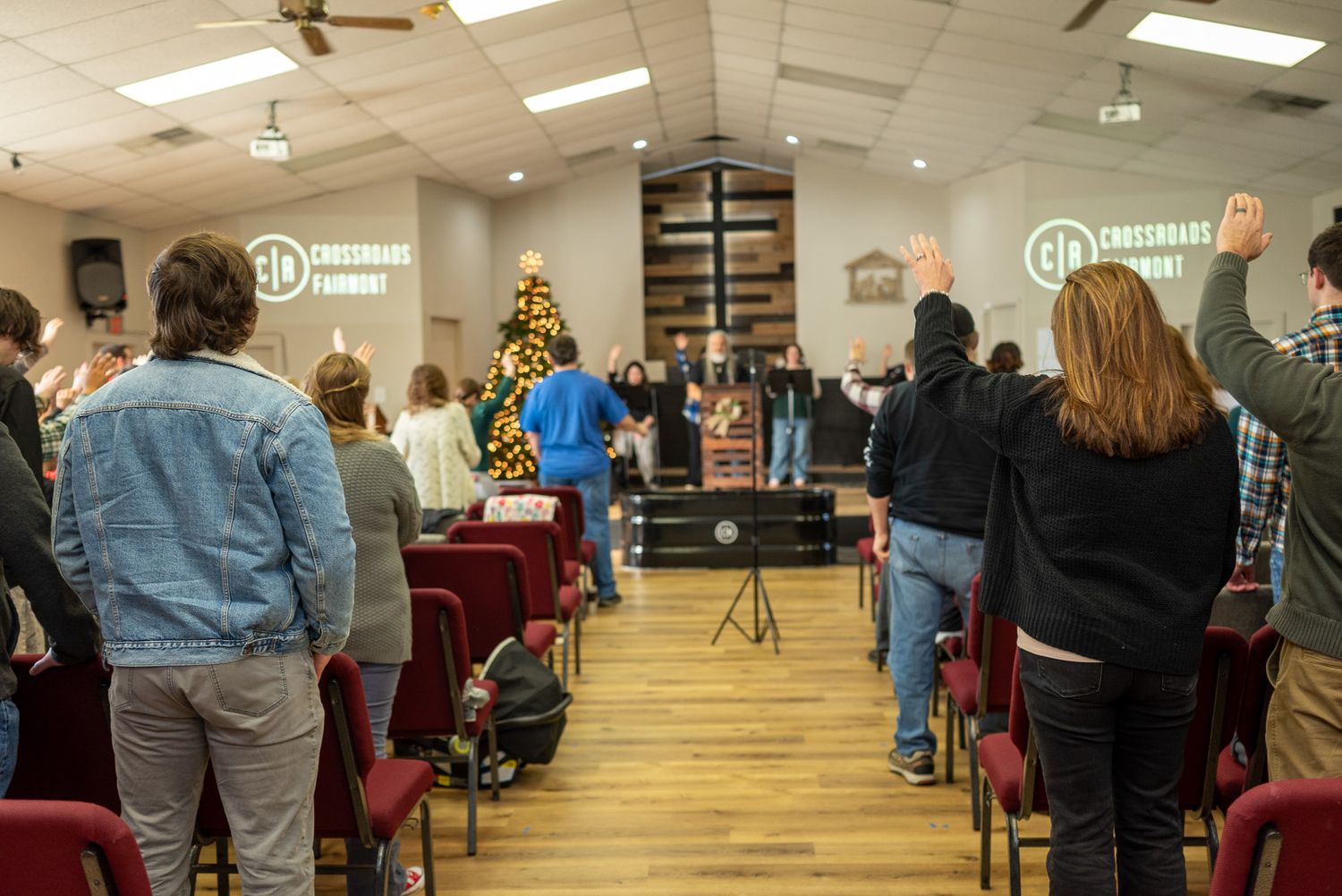 church members worship together in a Sunday gathering during the Christmas season at Crossroads Fairmont in Fairmont, WV