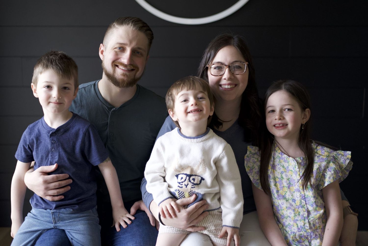 a portrait of Pastor Brandon and his family