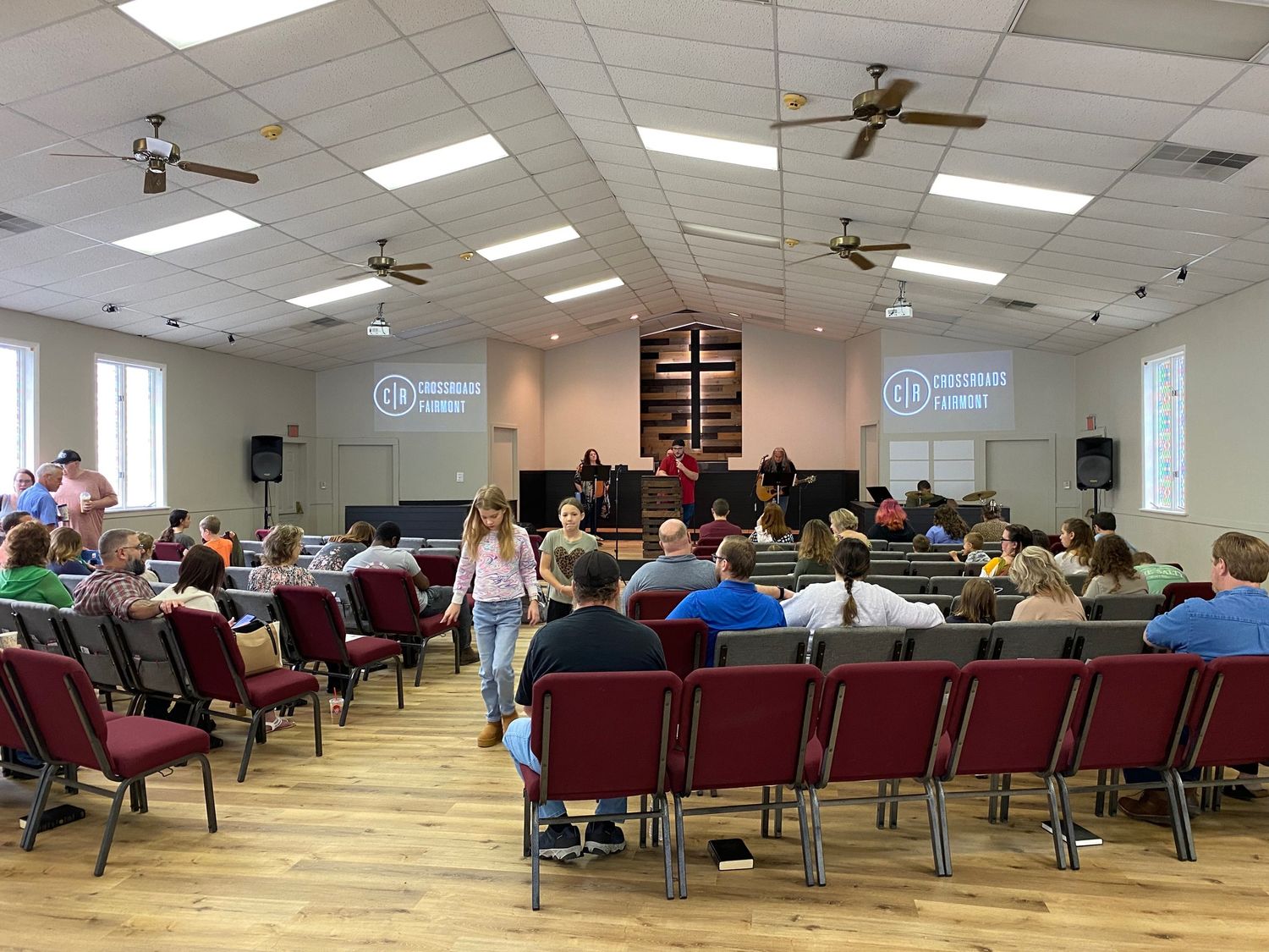 view of the seats and stage from the back of the Crossroads Fairmont auditorium during a Sunday morning church service in Fairmont, WV