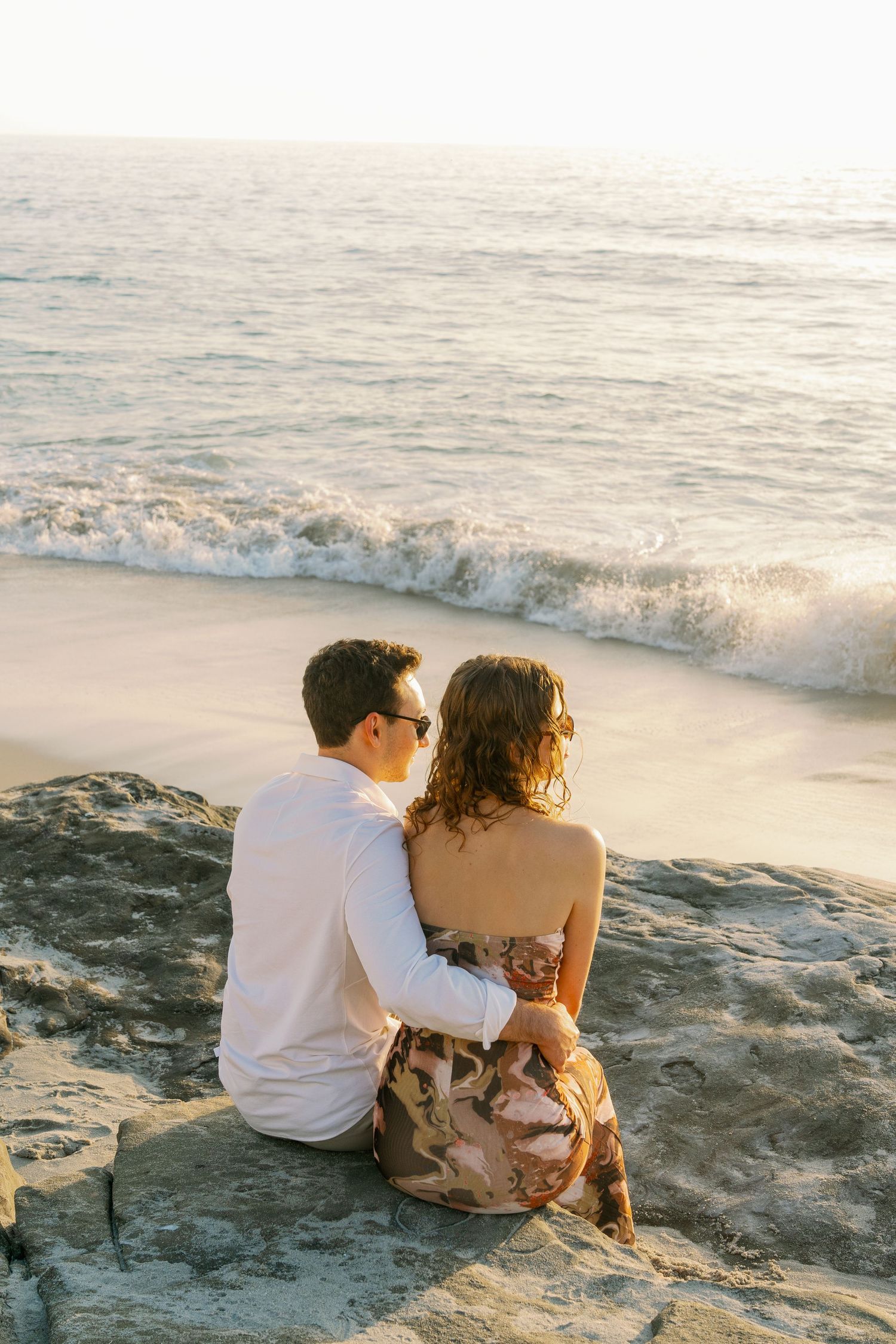 Couple's professional beach photoshoot at Windansea Beach in La Jolla, San Diego, California