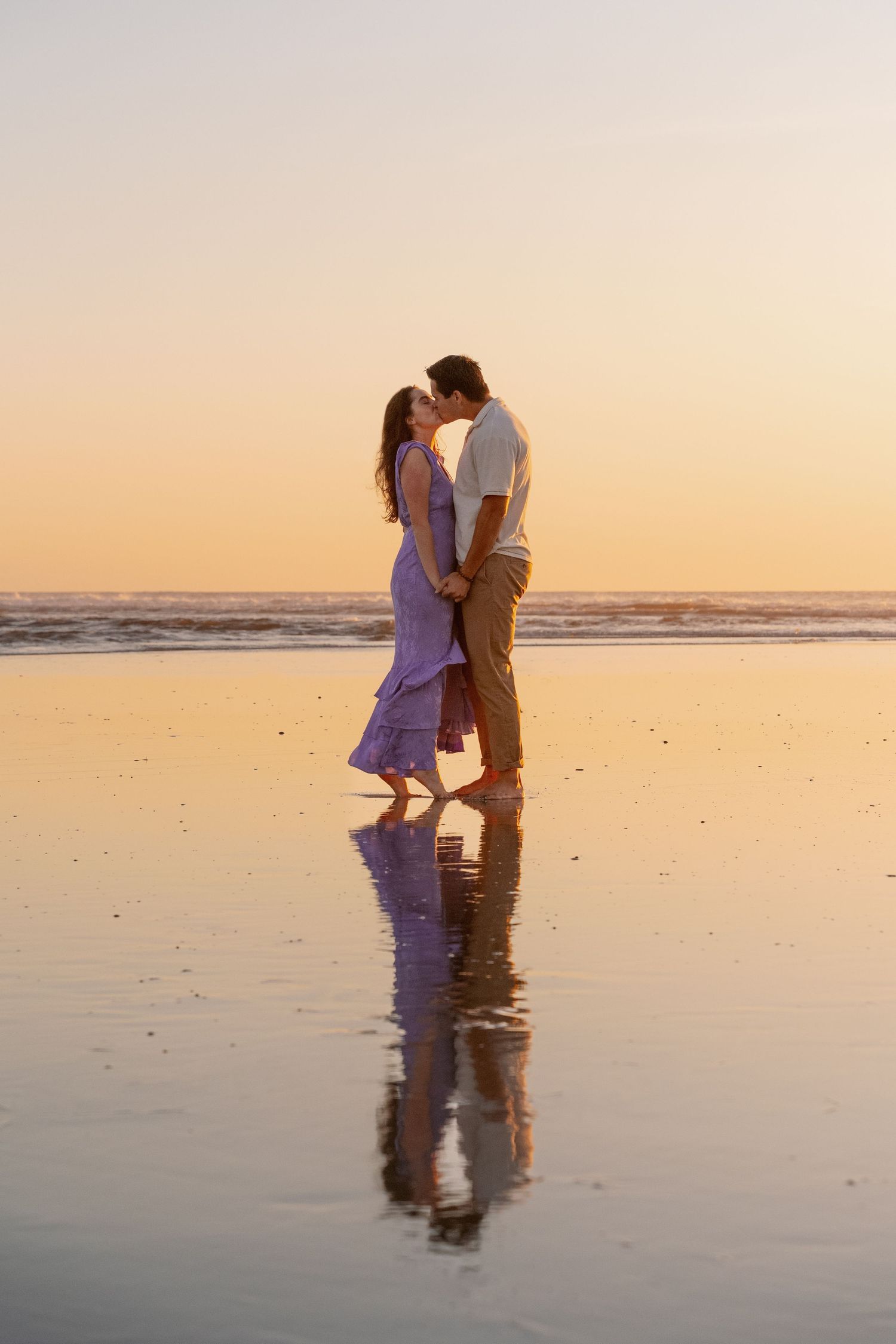 Couple's professional beach photoshoot at Del Mar Beach in San Diego, California