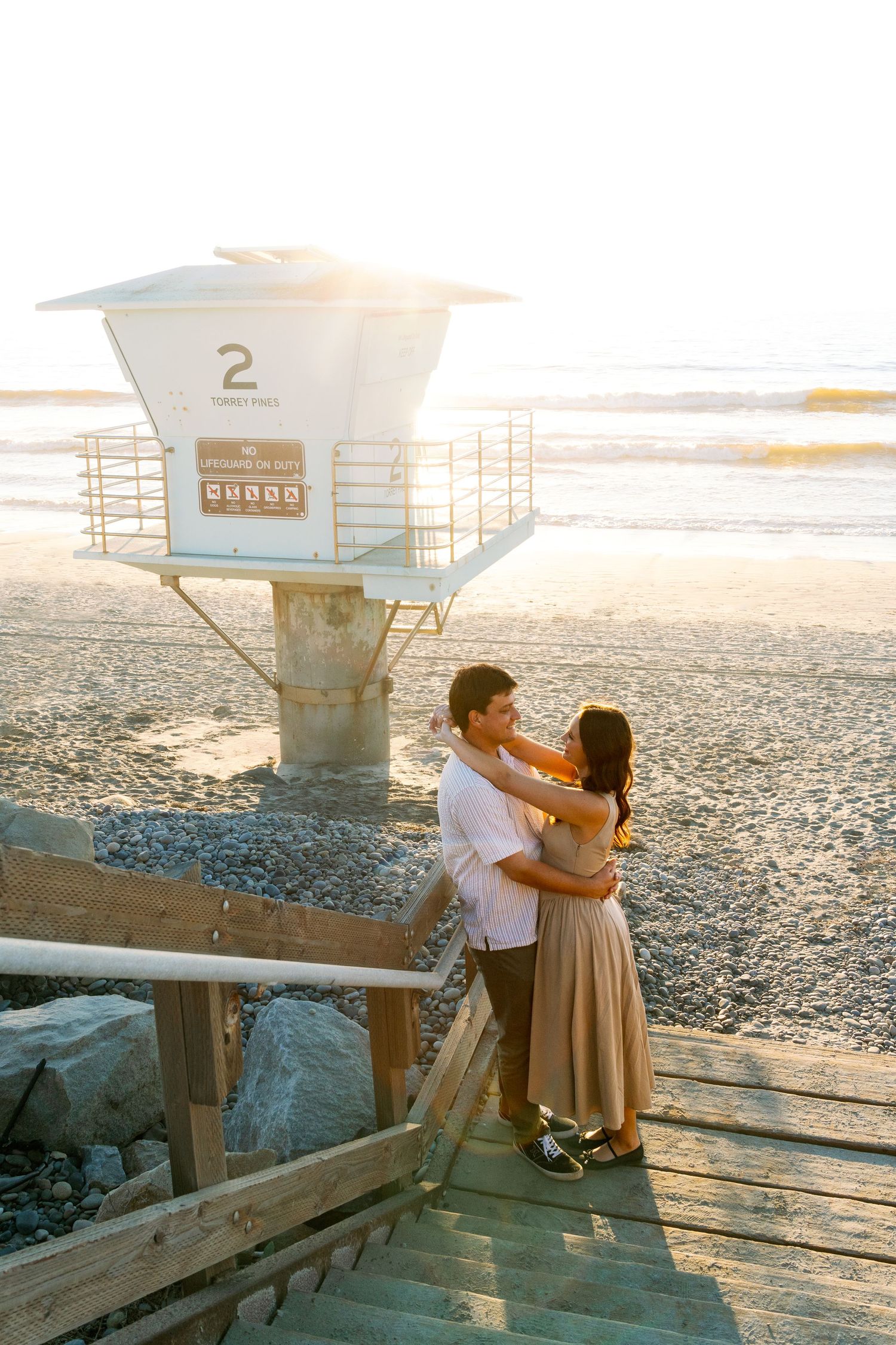 Couple's professional beach photoshoot at Torrey Pines Beach in San Diego, California