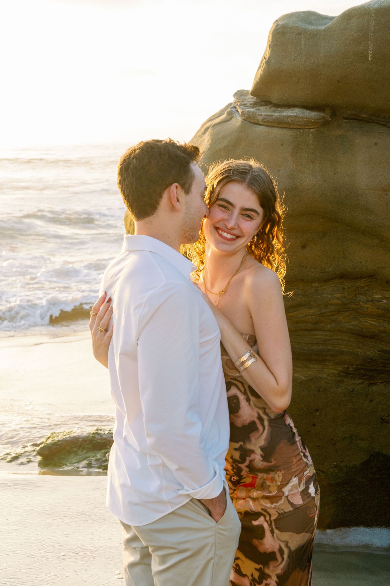 Couple's professional beach photoshoot at Windansea Beach in La Jolla, San Diego, California