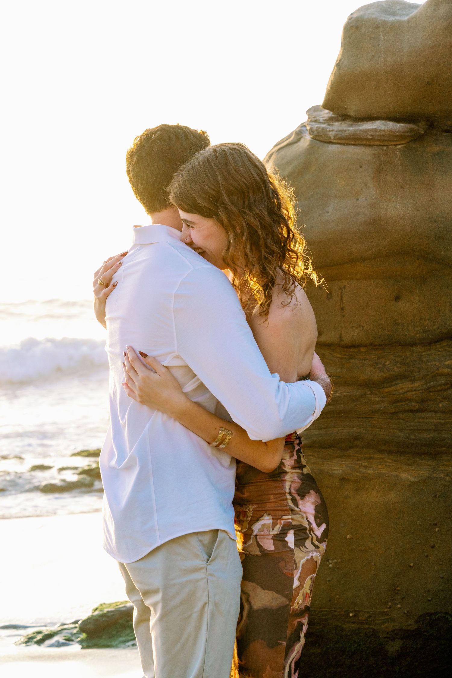Couple's professional beach photoshoot at Windansea Beach in La Jolla, San Diego, California